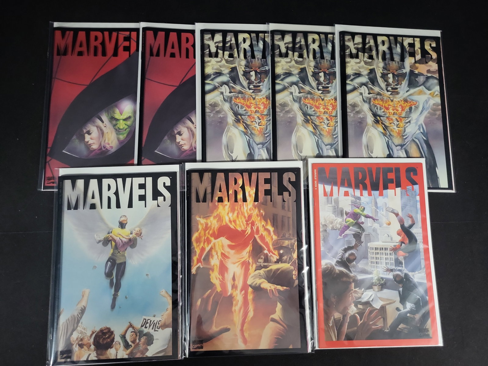 I02114 | A Collection of Eight Marvels Comic Books by Marvel Comics featuring Alex Ross Acetate (1 of 4)