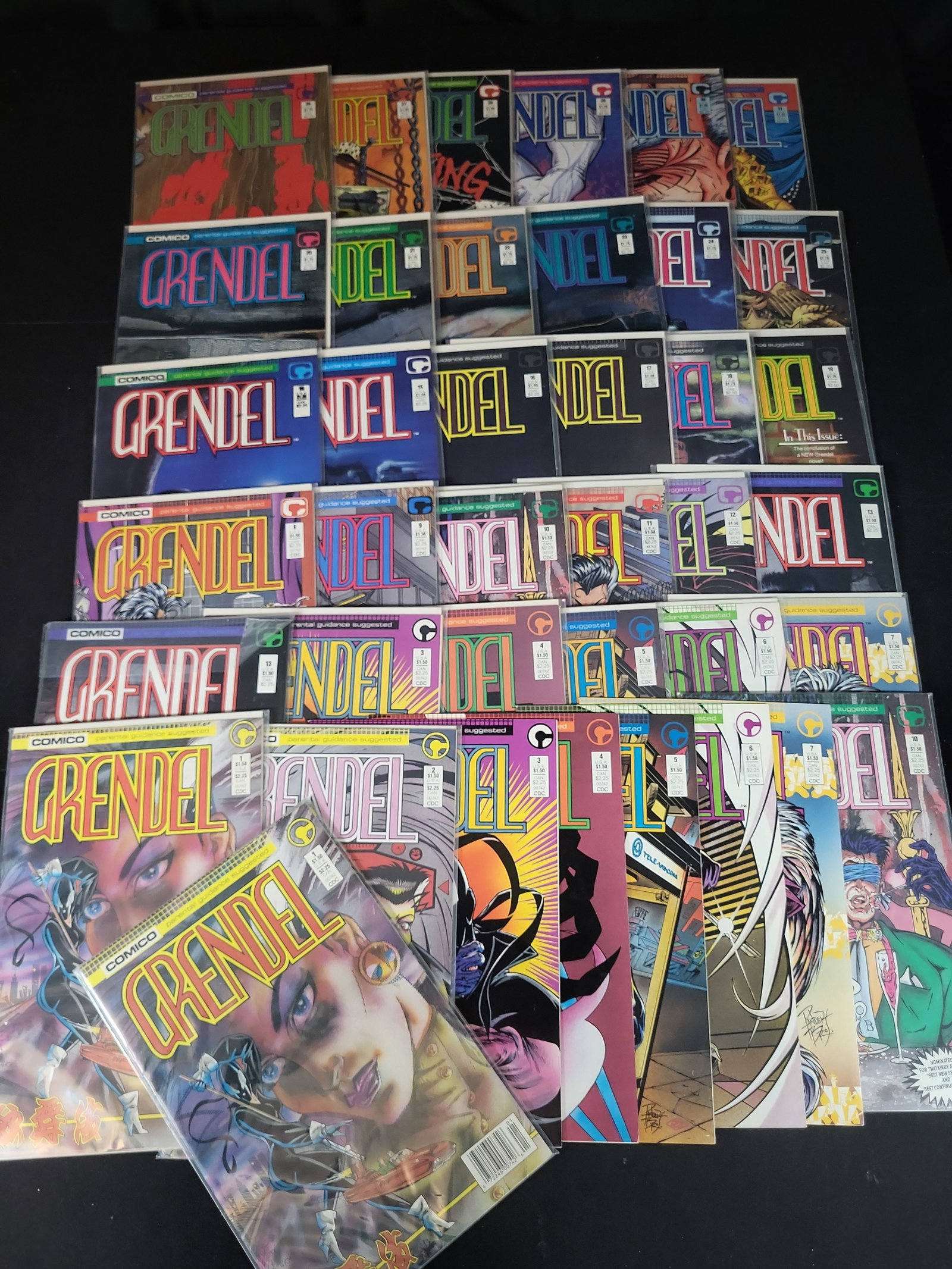 I02366 | A Collection of approximately 40 Comico Grendel Comic Books Including Issues 1-31 (1 of 7)