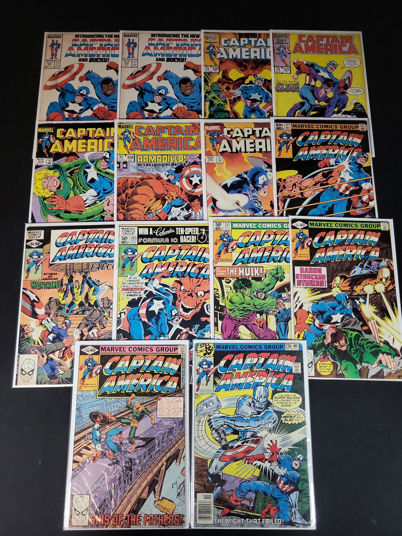 I02192 | Collection of 14 Captain America Comic Books Marvel Comics Group Bronze to Modern Age: BID PER WHAT YOU SEE IN THE PHOTO, NOT THE AI GENERATED TITLES AND DESCRIPTIONS! Collection of 14 Captain America Comic Books Marvel Comics Group Bronze to Modern Age This collection consists of 14 Ca