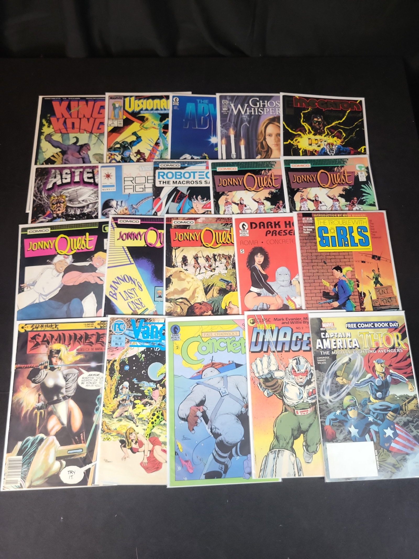 I02201 | An Assortment of Bronze and Modern Age Comic Books including Jonny Quest, Magnus Robot: BID PER WHAT YOU SEE IN THE PHOTO, NOT THE AI GENERATED TITLES AND DESCRIPTIONS! An Assortment of Bronze and Modern Age Comic Books including Jonny Quest, Magnus Robot Fighter, and Concrete This colle