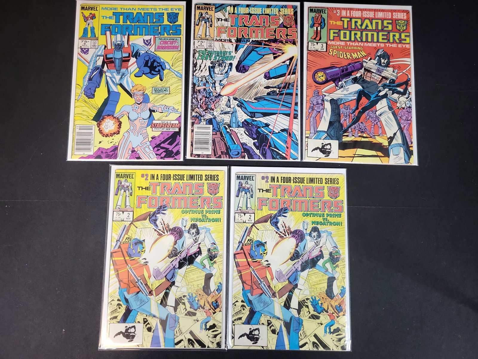 I02186 | A Lot of Five Marvel Comics The Transformers Issues 2, 3, 4, and 9 Published 1984-1985: BID PER WHAT YOU SEE IN THE PHOTO, NOT THE AI GENERATED TITLES AND DESCRIPTIONS! A Lot of Five Marvel Comics The Transformers Issues 2, 3, 4, and 9 Published 1984-1985 This is a lot of five vintage co