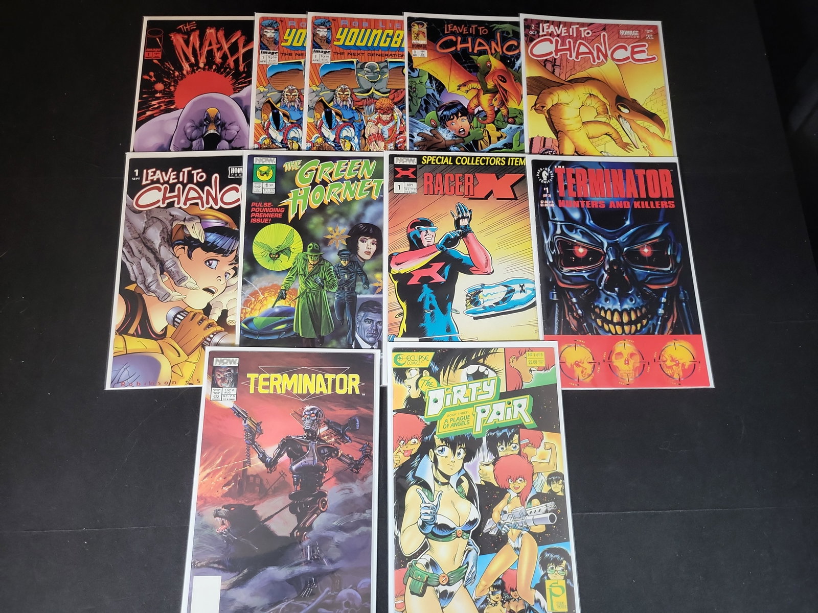 I02232 | A Collection of 11 Modern Age Comic Books Including The Maxx and The Terminator: BID PER WHAT YOU SEE IN THE PHOTO, NOT THE AI GENERATED TITLES AND DESCRIPTIONS! A Collection of 11 Modern Age Comic Books Including The Maxx and The Terminator This collection consists of 11 comic bo