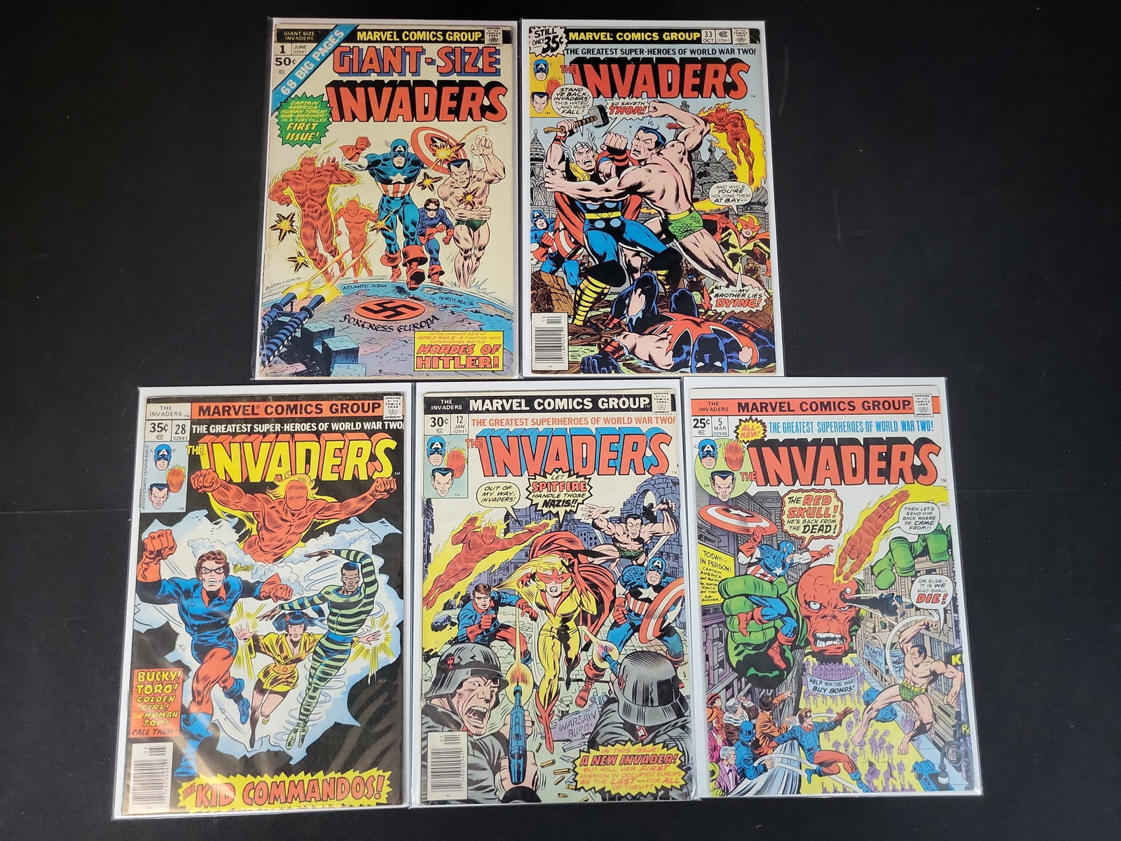 I02160 | Five Marvel Bronze Age The Invaders Comic Books Including Giant-Size Number 1 and Issue 12 (1 of 4)