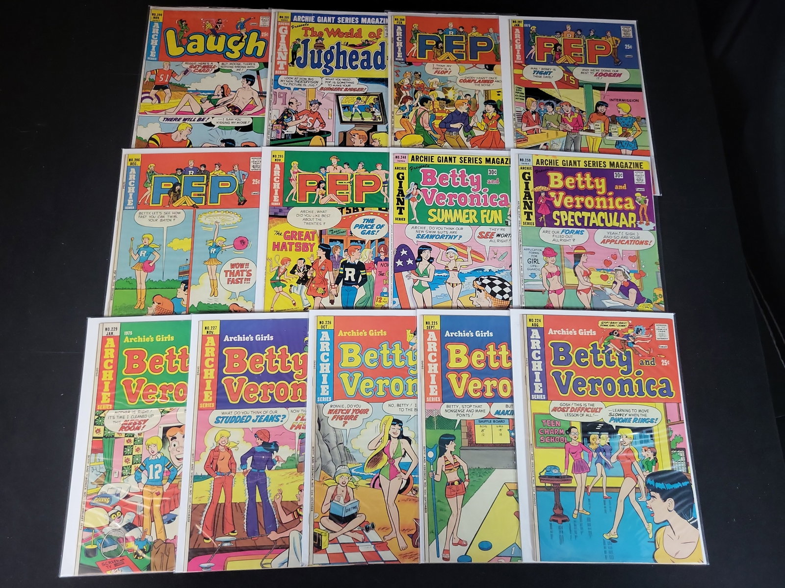 I02357 | Collection of 13 Vintage Archie Series Comic Books Including Pep, Laugh, and Betty and: BID PER WHAT YOU SEE IN THE PHOTO, NOT THE AI GENERATED TITLES AND DESCRIPTIONS! Collection of 13 Vintage Archie Series Comic Books Including Pep, Laugh, and Betty and Veronica, 1974-1975 This collect