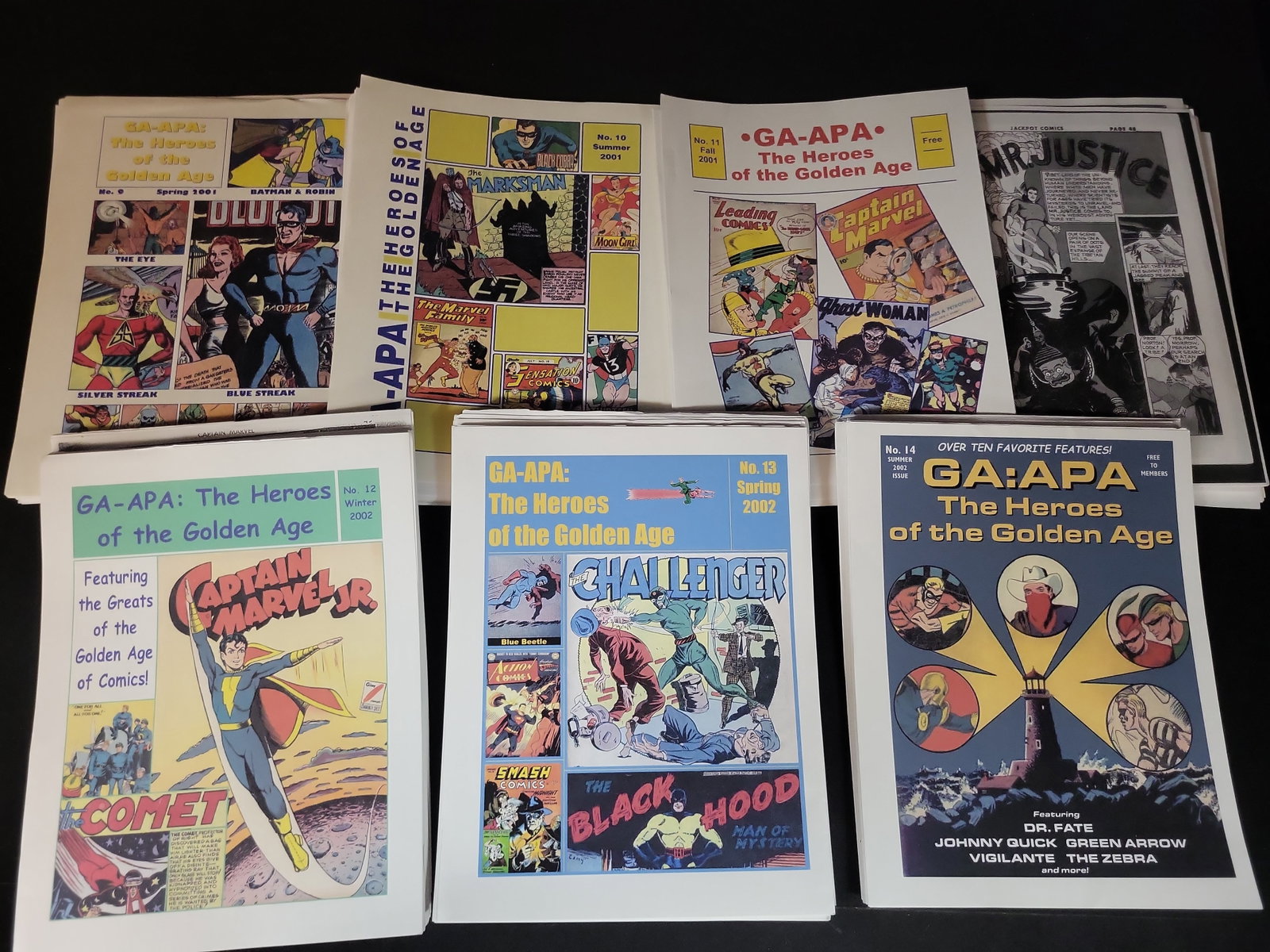 I02975 | A Collection of GA-APA The Heroes of the Golden Age Comic Fanzines: BID PER WHAT YOU SEE IN THE PHOTO, NOT THE AI GENERATED TITLES AND DESCRIPTIONS! A Collection of GA-APA The Heroes of the Golden Age Comic Fanzines A collection of seven fanzine publications titled Th
