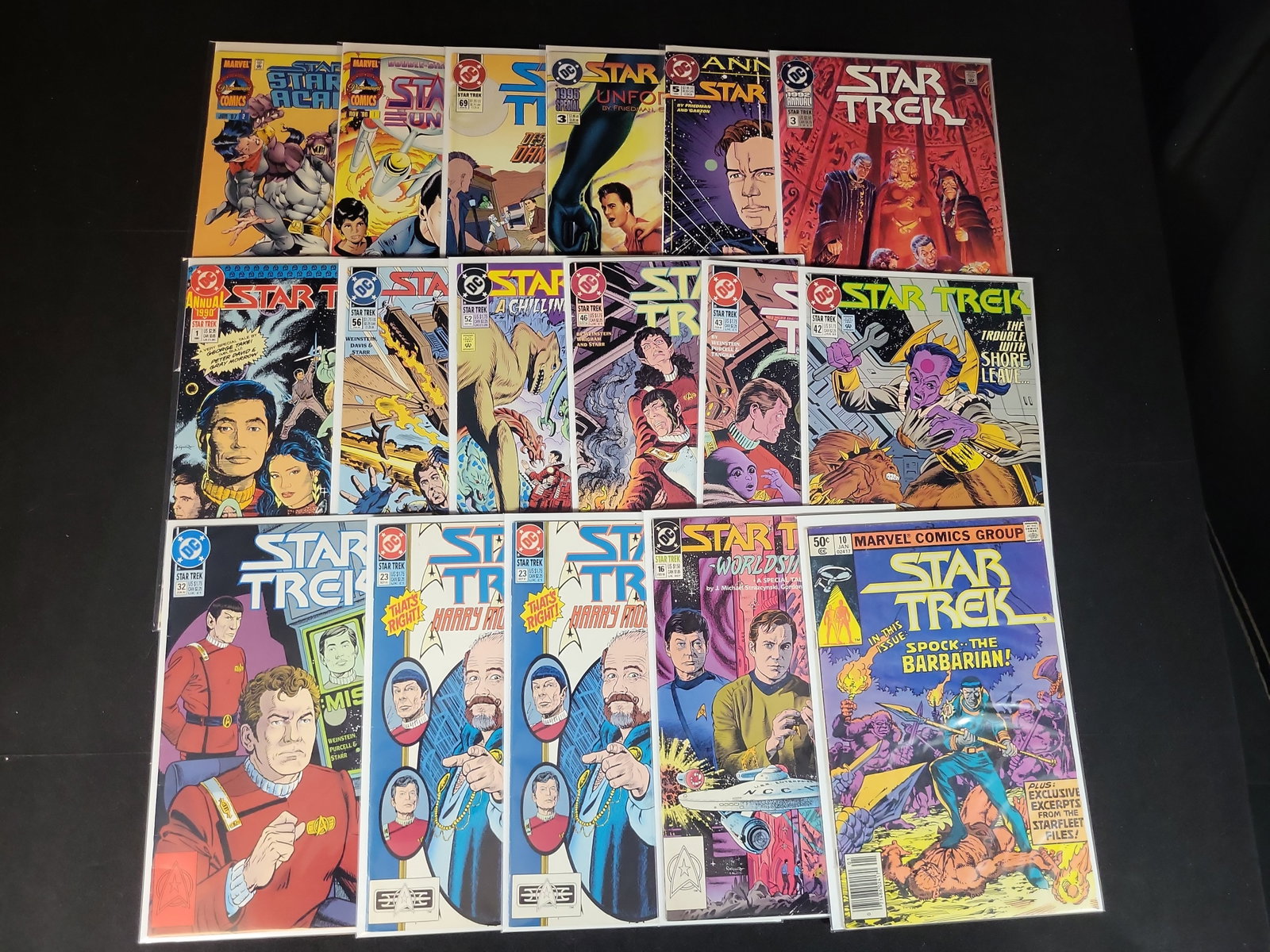 I02169 | A Collection of 18 Star Trek Comic Books from Marvel and DC Comics: BID PER WHAT YOU SEE IN THE PHOTO, NOT THE AI GENERATED TITLES AND DESCRIPTIONS! A Collection of 18 Star Trek Comic Books from Marvel and DC Comics This collection consists of 18 Star Trek comic books