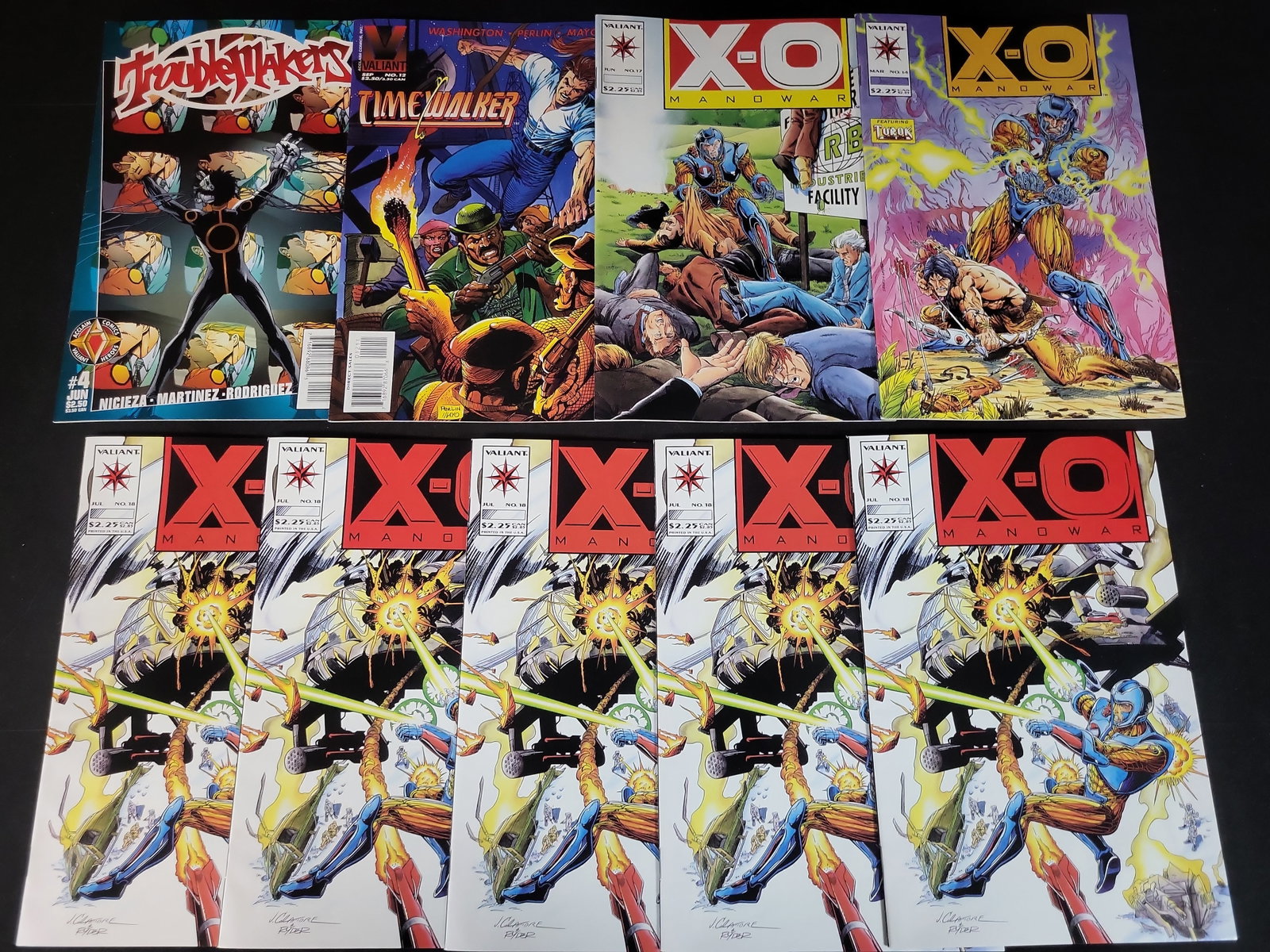 I02505 | Nine Valiant and Acclaim Comics Featuring X-O Manowar, Timewalker, and Troublemakers: BID PER WHAT YOU SEE IN THE PHOTO, NOT THE AI GENERATED TITLES AND DESCRIPTIONS! Nine Valiant and Acclaim Comics Featuring X-O Manowar, Timewalker, and Troublemakers This lot consists of nine comic bo