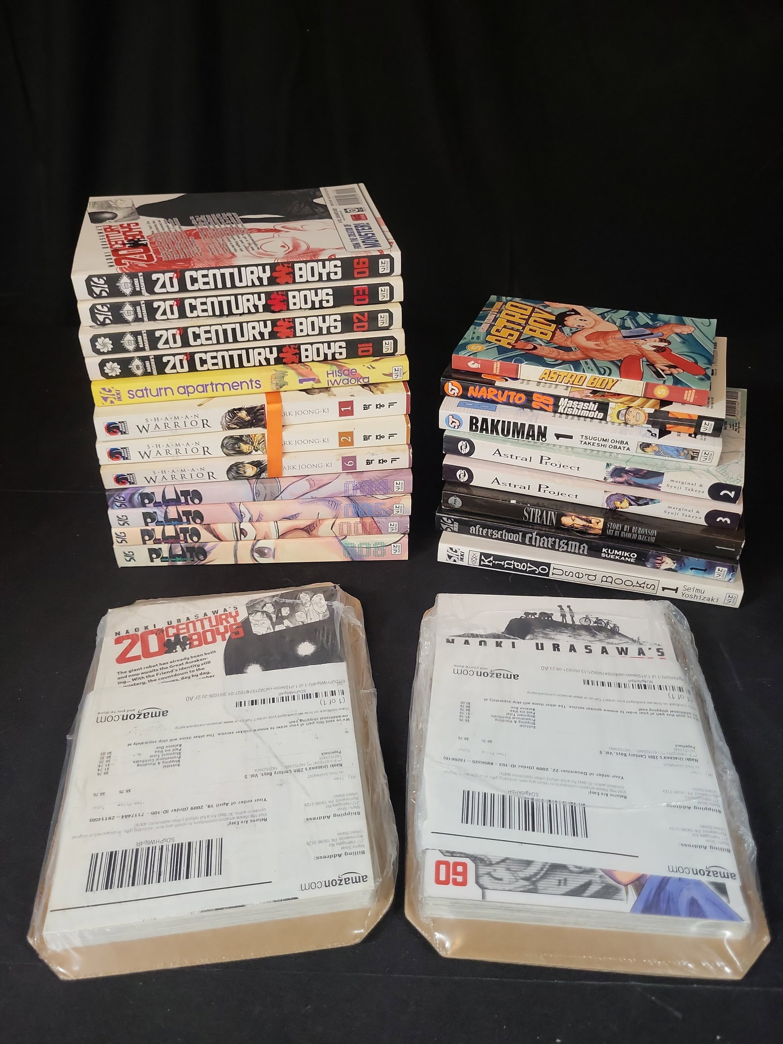 I02842 | Urasawa, Naoki, et al. A Collection of Manga Volumes. Viz Media and Other Publishers,: BID PER WHAT YOU SEE IN THE PHOTO, NOT THE AI GENERATED TITLES AND DESCRIPTIONS! Urasawa, Naoki, et al. A Collection of Manga Volumes. Viz Media and Other Publishers, 2003-2010. This lot consists of a