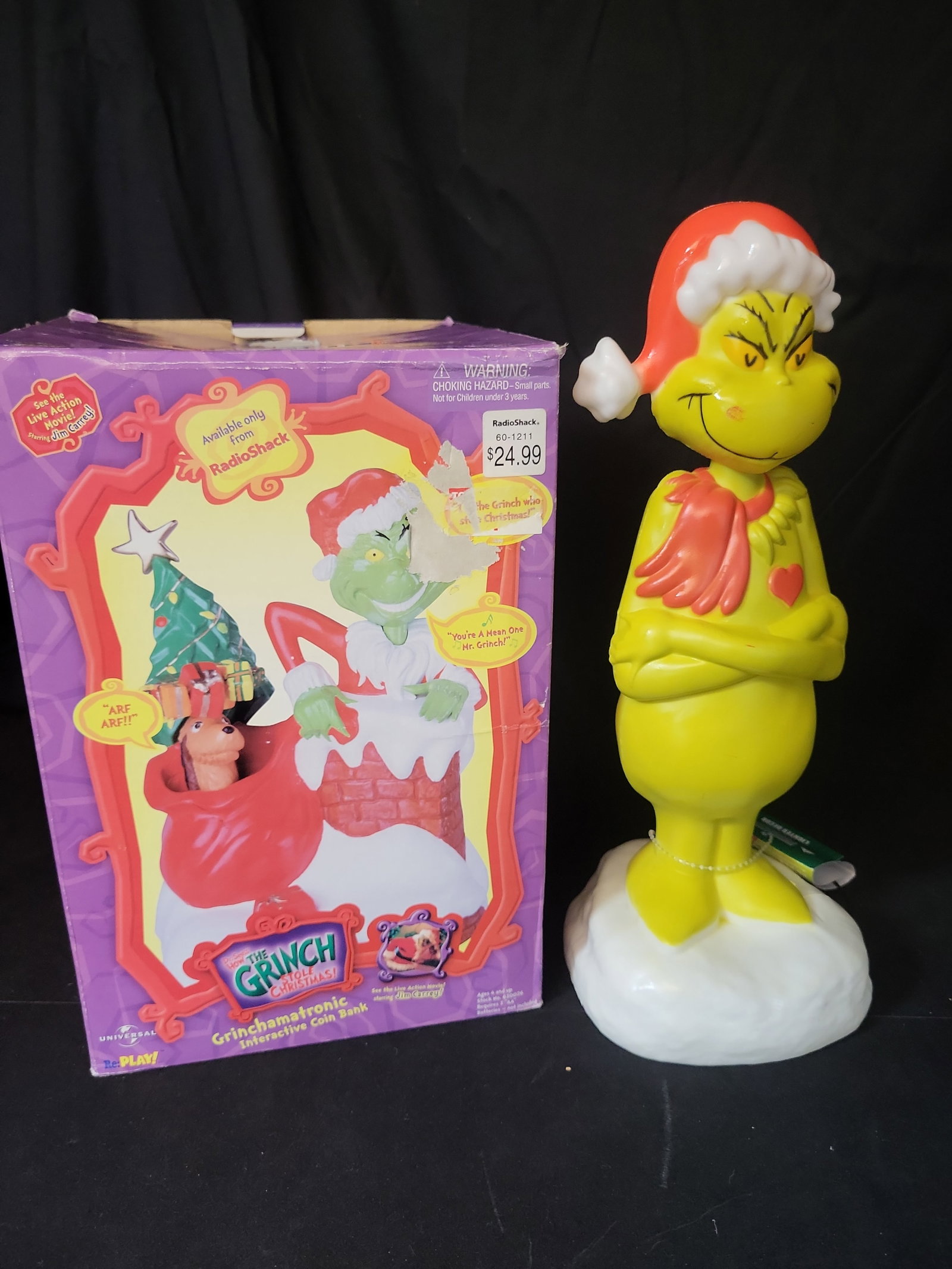 I02821 | Two Dr. Seuss The Grinch Holiday Collectibles Including an Interactive Bank and a Lighted (1 of 7)