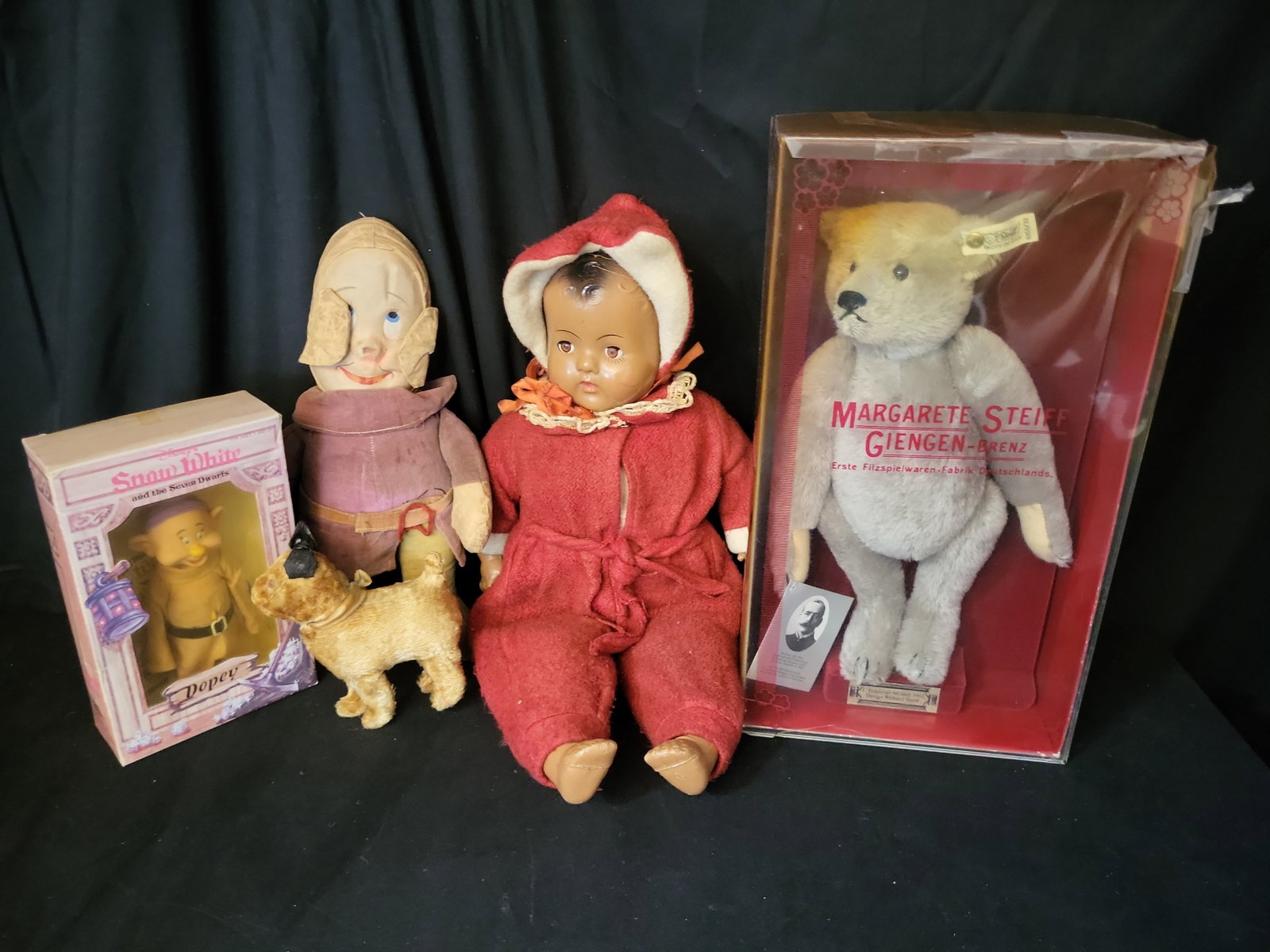 I02825 | A Collection of Vintage and Antique Toys and Dolls Including Steiff and Disney: BID PER WHAT YOU SEE IN THE PHOTO, NOT THE AI GENERATED TITLES AND DESCRIPTIONS! A Collection of Vintage and Antique Toys and Dolls Including Steiff and Disney A collection of vintage and antique doll