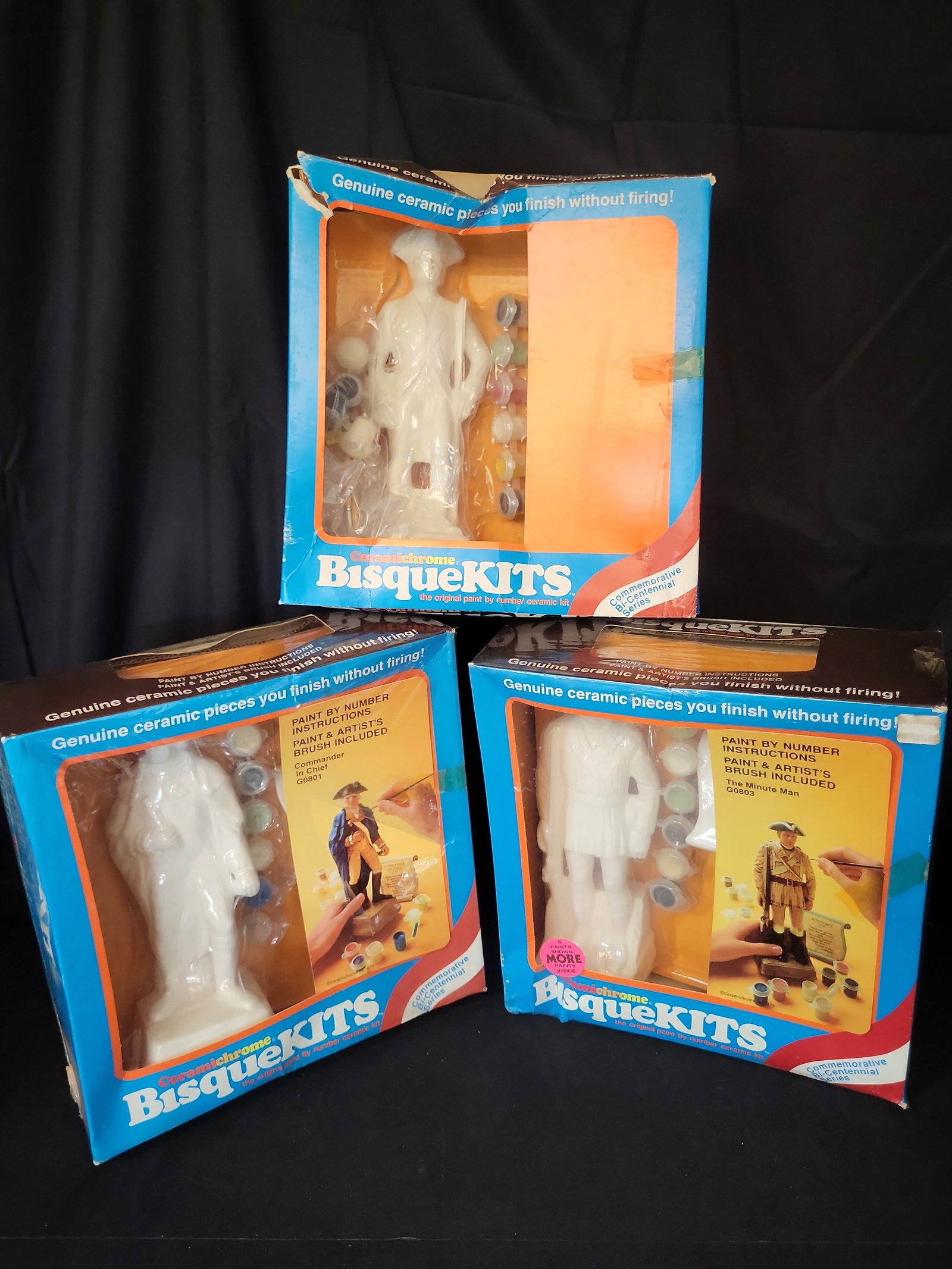 I02824 | Three Vintage 1973 Ceramichrome BisqueKITS Commemorative Bi-Centennial Series: BID PER WHAT YOU SEE IN THE PHOTO, NOT THE AI GENERATED TITLES AND DESCRIPTIONS! Three Vintage 1973 Ceramichrome BisqueKITS Commemorative Bi-Centennial Series Paint-By-Number Ceramic Kits This lot fea