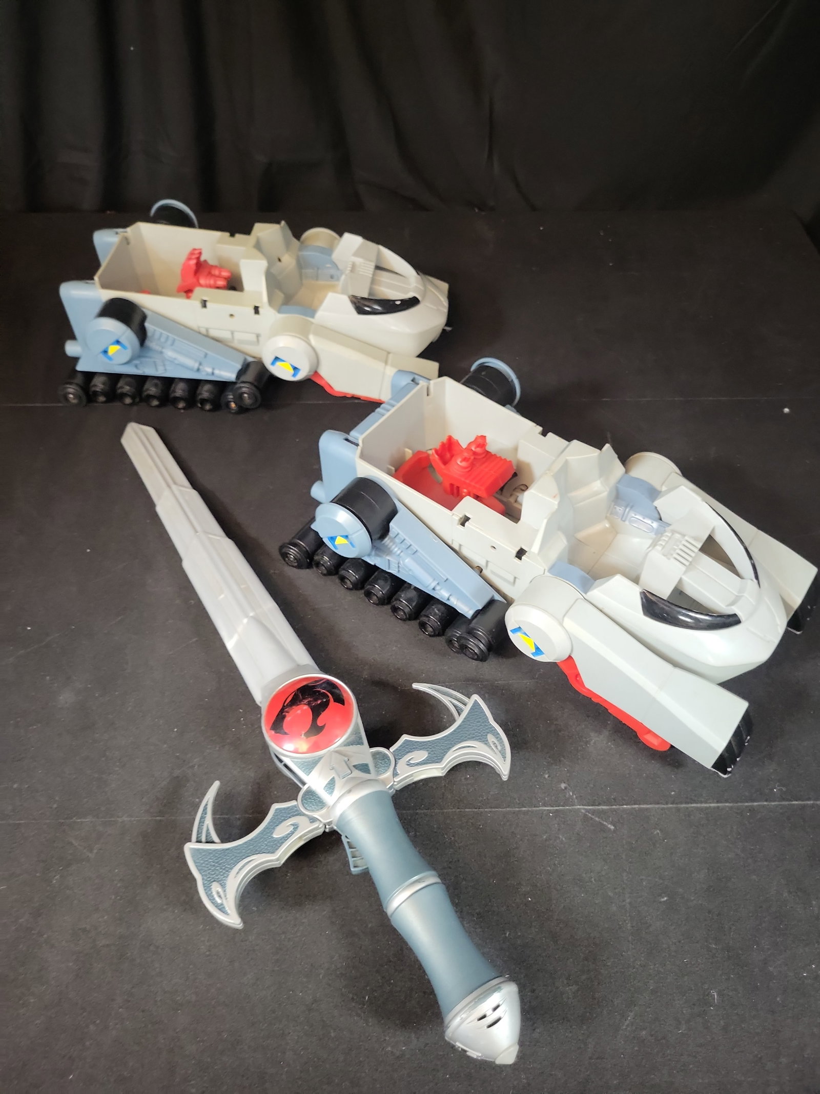 I02826 | Three Bandai 2011 ThunderCats Toys Including Two ThunderTanks and a Sword of Omens (1 of 7)