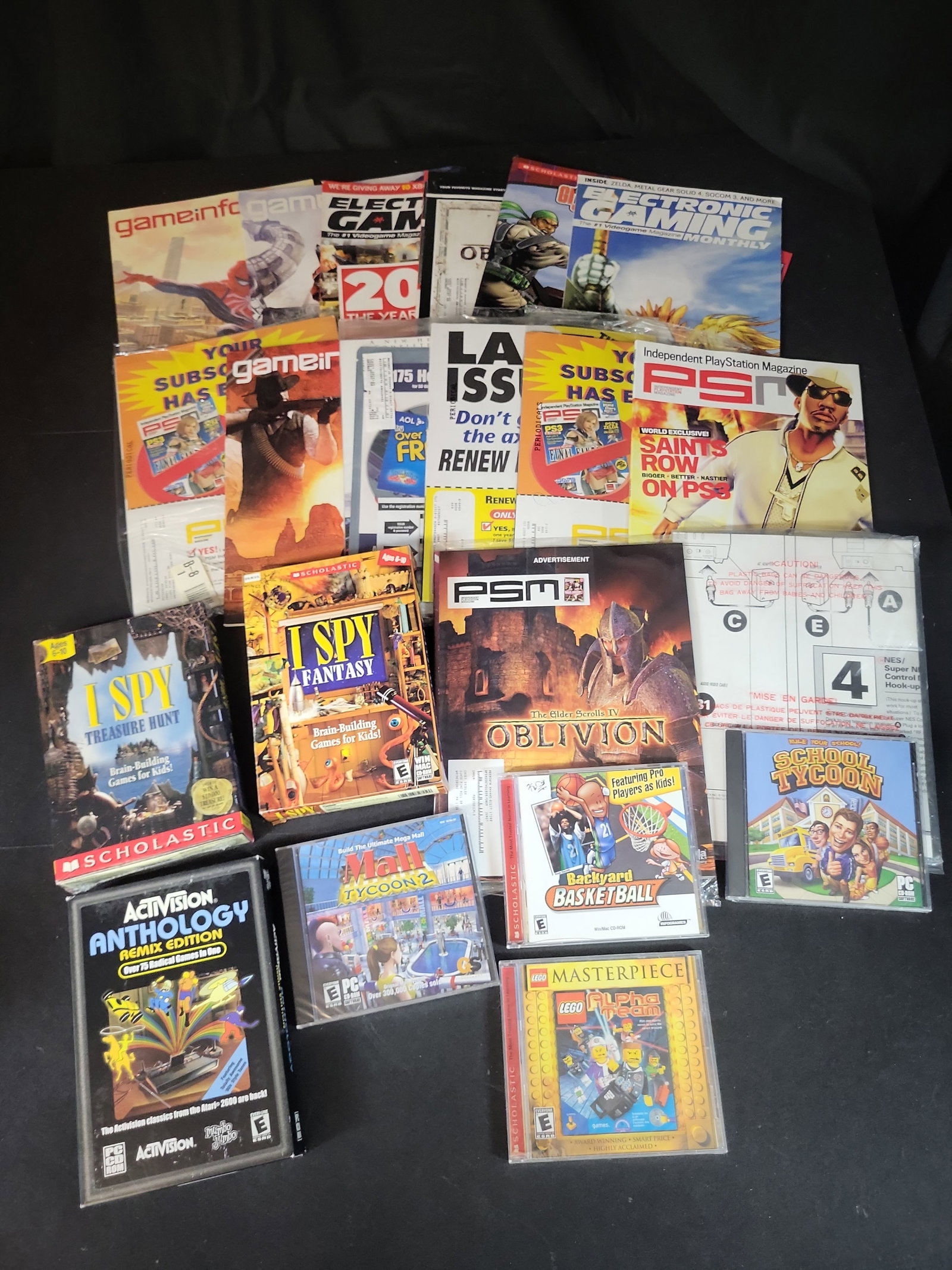 I02931 | An Assortment of Vintage Early 2000s PC Games and Video Game Magazines (1 of 4)