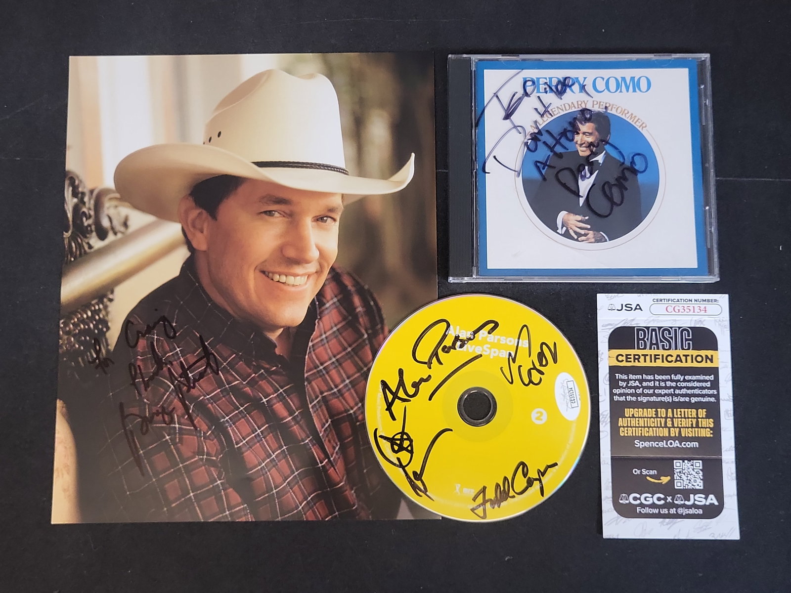 I03388 | A Trio of Autographed Music Memorabilia Including George Strait, Perry Como, and Alan (1 of 4)