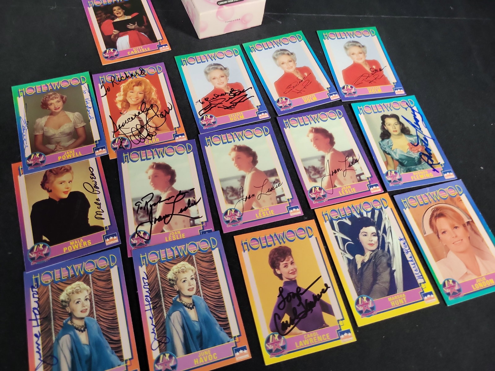 I03451 | A Collection of Starline Hollywood Walk of Fame Autographed Trading Cards and an All My: BID PER WHAT YOU SEE IN THE PHOTO, NOT THE AI GENERATED TITLES AND DESCRIPTIONS! This collection features seventeen trading cards from the 1991 Starline Hollywood Walk of Fame series alongside one box