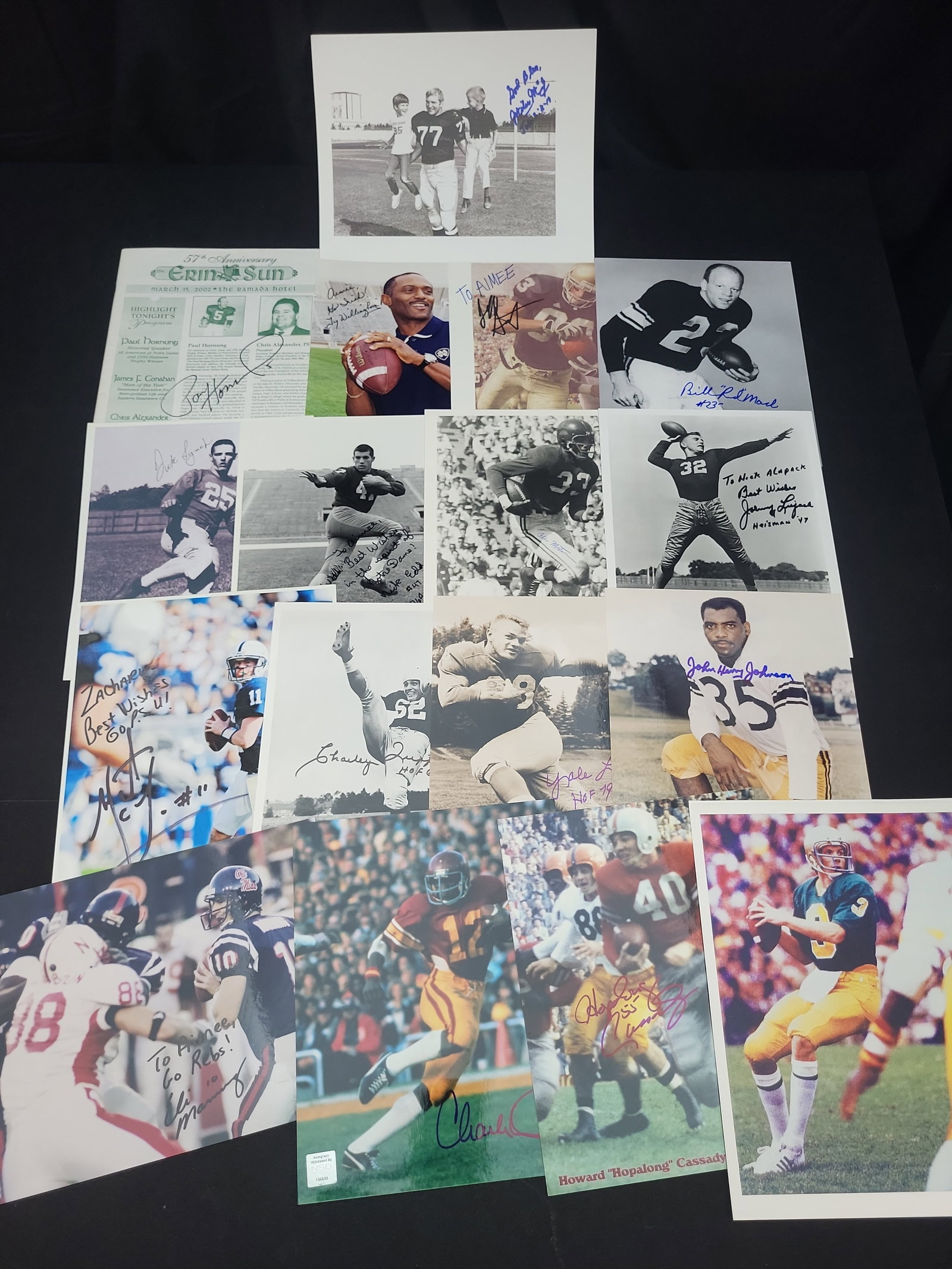 I03005 | A Collection of Approximately 15 Autographed Football Photographs and Memorabilia Featuring: BID PER WHAT YOU SEE IN THE PHOTO, NOT THE AI GENERATED TITLES AND DESCRIPTIONS! A Collection of Approximately 15 Autographed Football Photographs and Memorabilia Featuring Heisman Trophy Winners and 