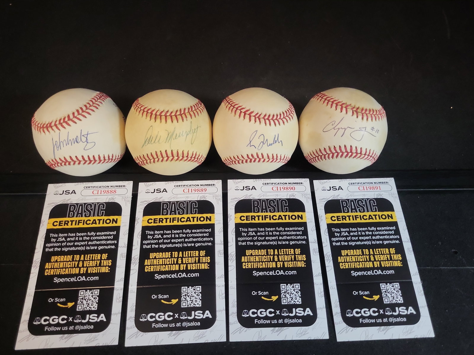 I03100 | A Collection of Four Autographed Atlanta Braves Baseballs with JSA Authentication (1 of 7)