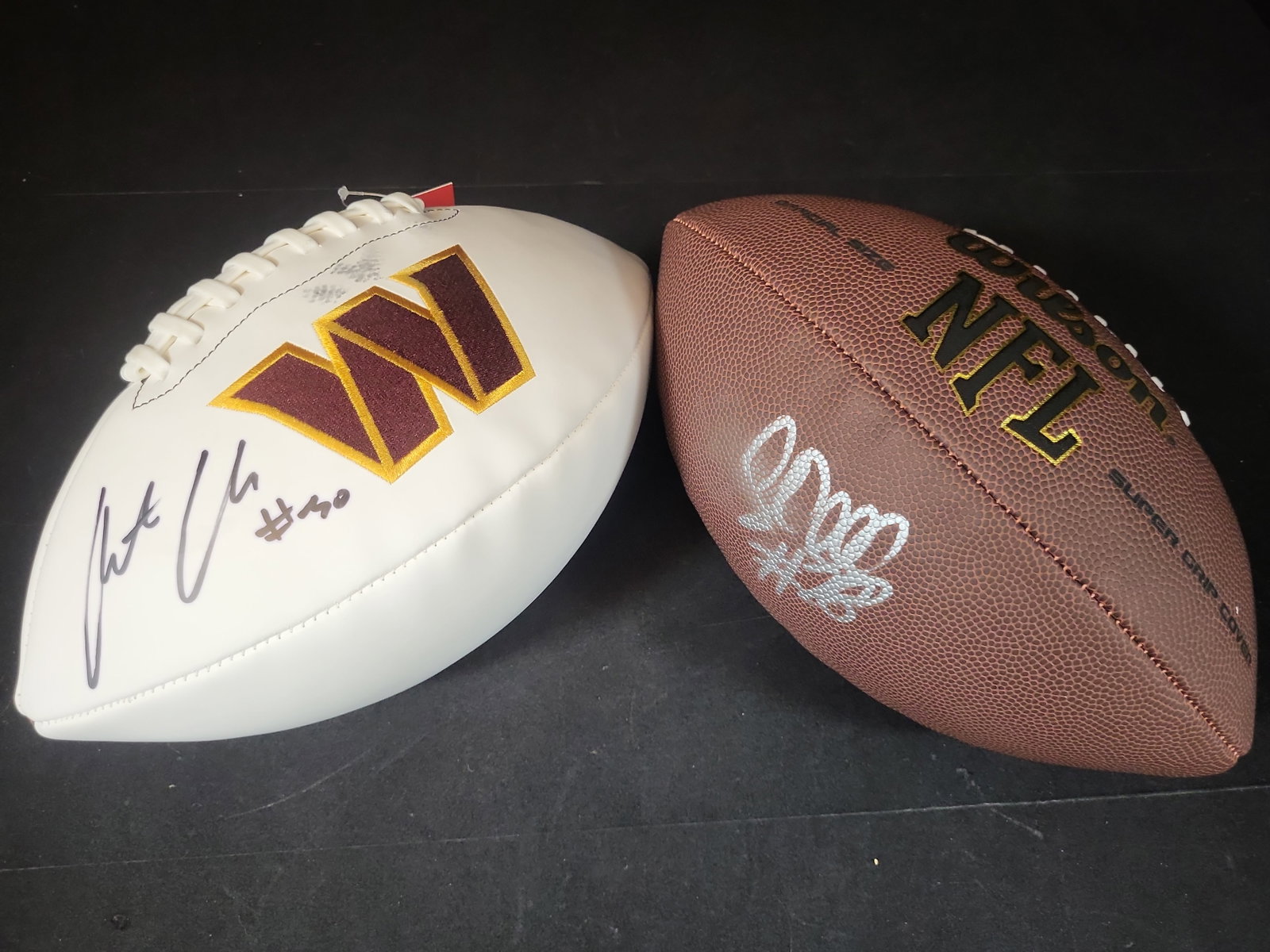 I03093 | Two Autographed NFL Footballs Featuring Jamin Davis and Mike Evans (1 of 7)