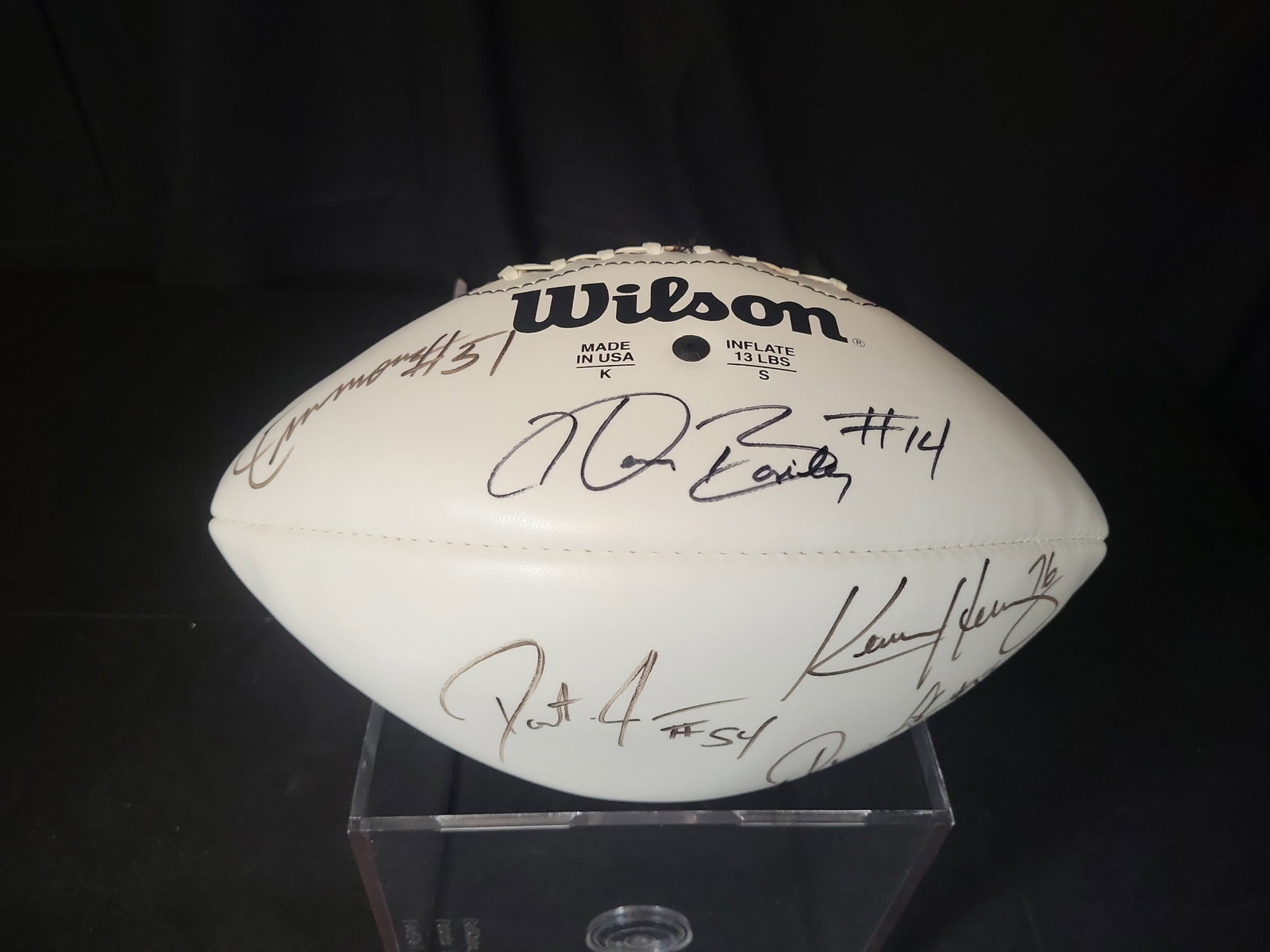 I03064 | Wilson Official NFL Multi-Signed New England Patriots Football: BID PER WHAT YOU SEE IN THE PHOTO, NOT THE AI GENERATED TITLES AND DESCRIPTIONS! Wilson Official NFL Multi-Signed New England Patriots Football This Wilson Official NFL football features two white pan