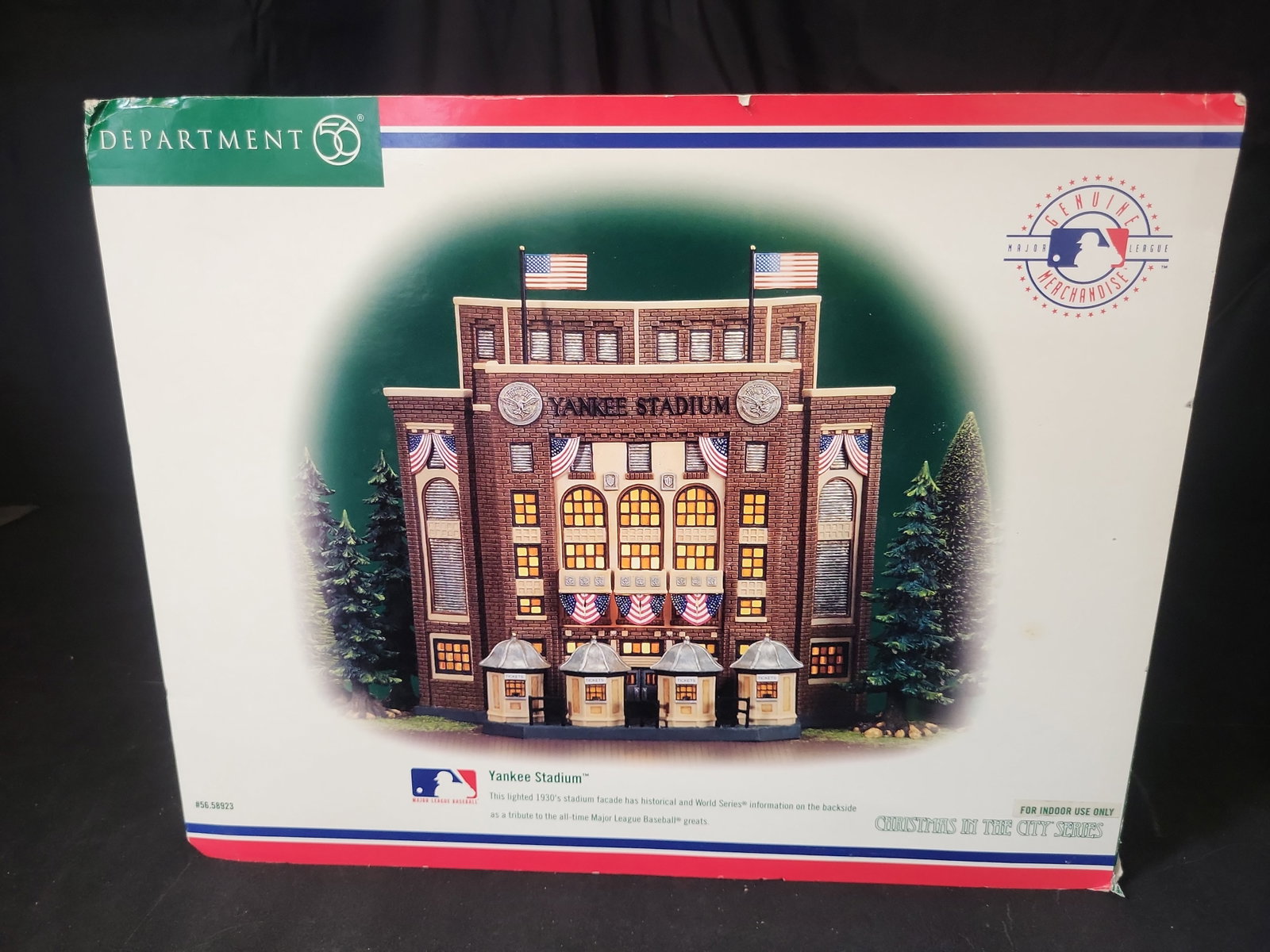 I03233 | Department 56 Christmas in the City Series Yankee Stadium Facade Lighted Building 56.58923: BID PER WHAT YOU SEE IN THE PHOTO, NOT THE AI GENERATED TITLES AND DESCRIPTIONS! This is a Department 56 hand-painted porcelain lighted building replica from the Christmas in the City Series, modeled 