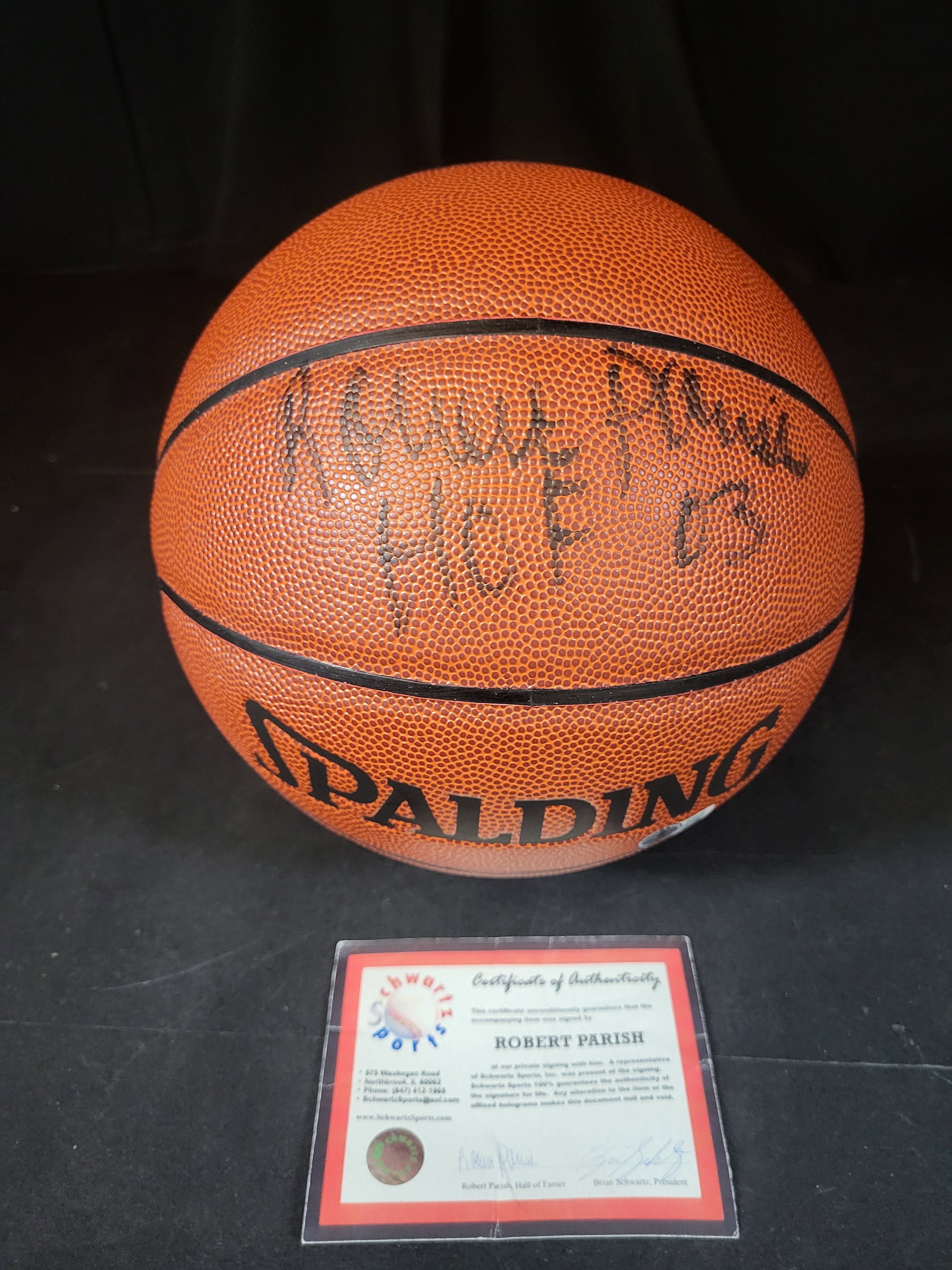 I03087 | Robert Parish Autographed Spalding Indoor Outdoor Basketball with HOF 03 Inscription and (1 of 6)