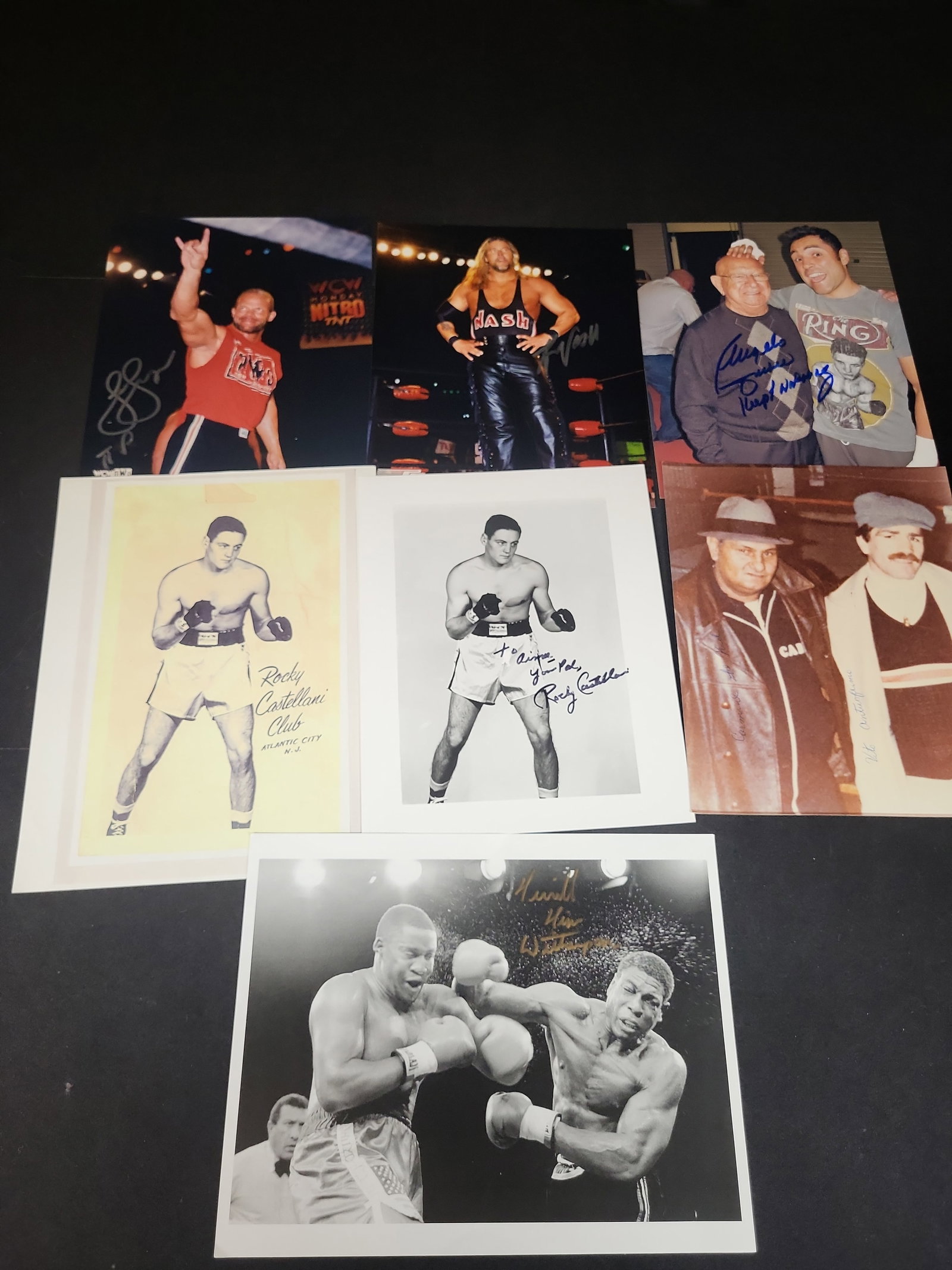 I03018 | A Collection of Autographed Boxing and Professional Wrestling Photographs with COAs: BID PER WHAT YOU SEE IN THE PHOTO, NOT THE AI GENERATED TITLES AND DESCRIPTIONS! A Collection of Autographed Boxing and Professional Wrestling Photographs with COAs This lot consists of seven autograp