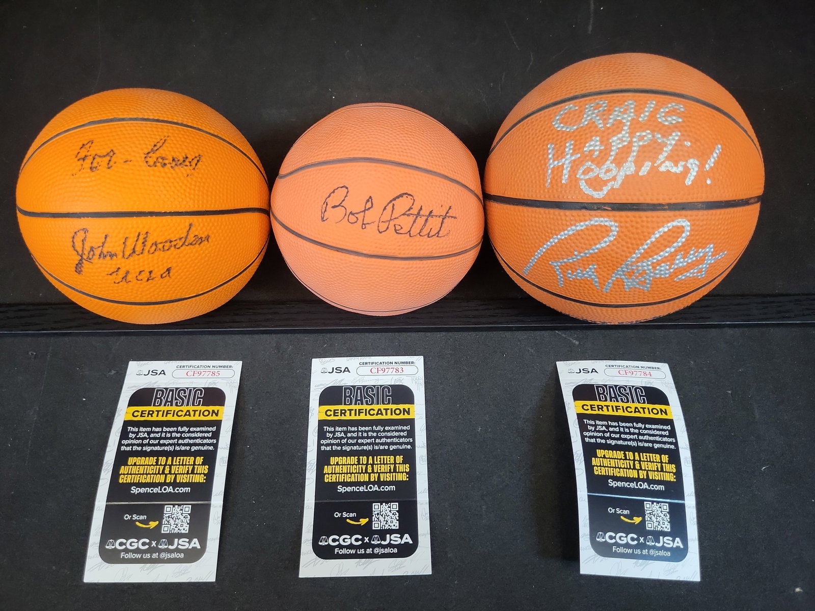I03444 | A Trio of Autographed Basketball Legend Mini-Basketballs Including John Wooden, Bob Pettit, (1 of 8)