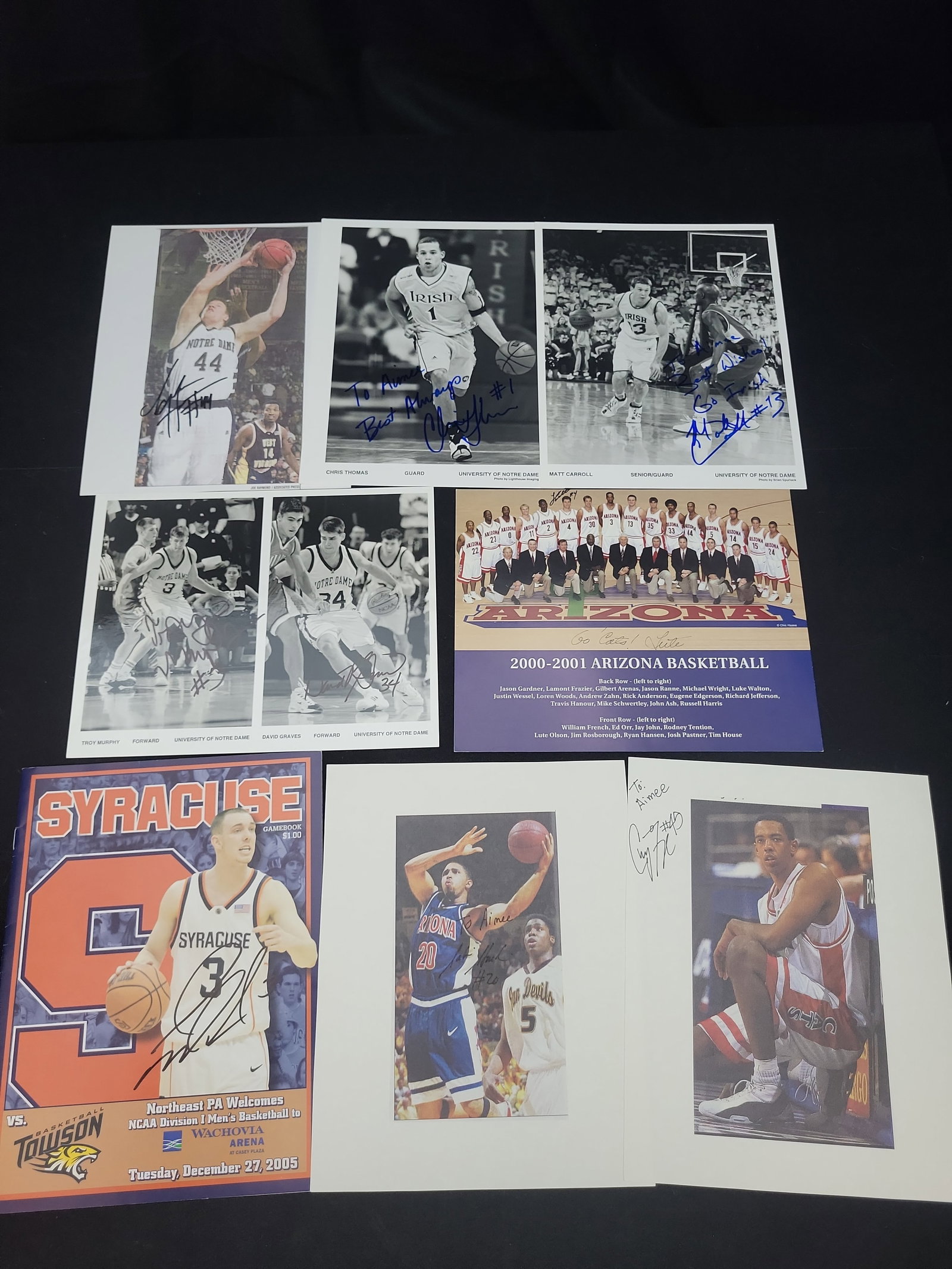I03009 | A Collection of Autographed NCAA Basketball Photographs and Memorabilia Including Notre: BID PER WHAT YOU SEE IN THE PHOTO, NOT THE AI GENERATED TITLES AND DESCRIPTIONS! A Collection of Autographed NCAA Basketball Photographs and Memorabilia Including Notre Dame Arizona and Syracuse This 