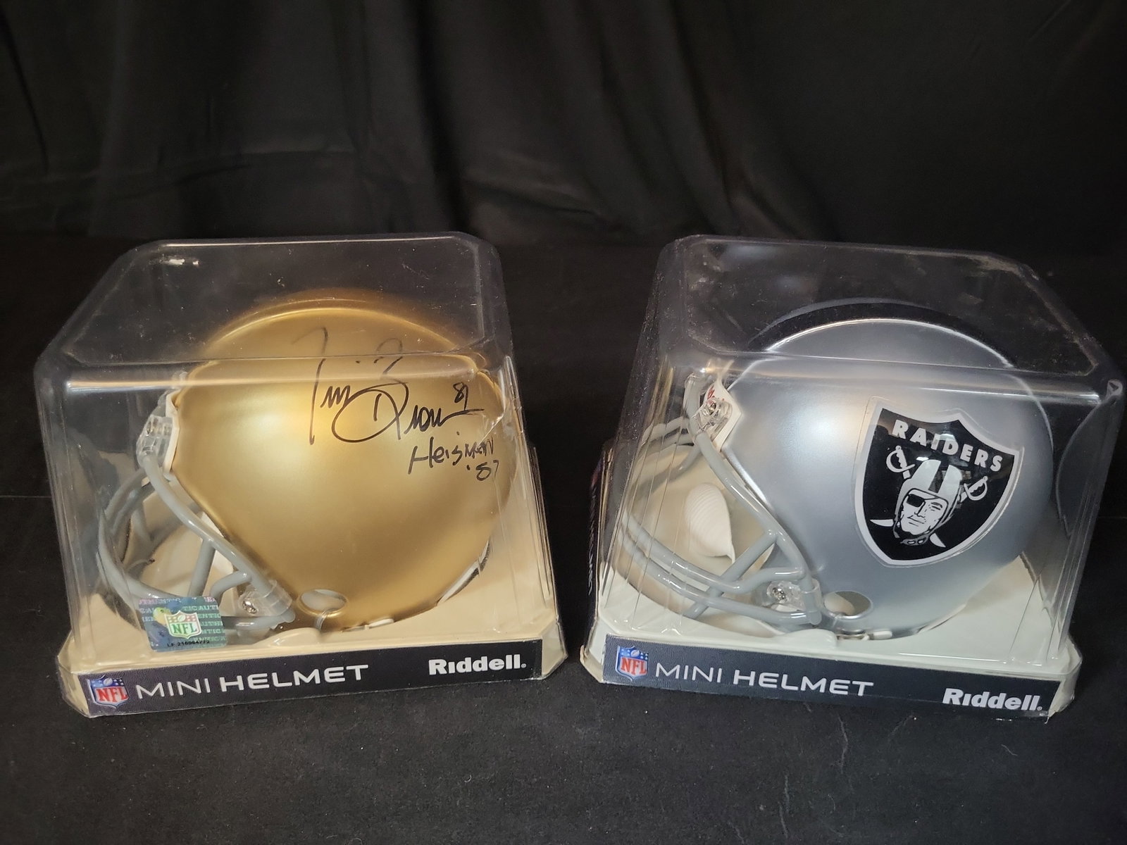 I03052 | A Pair of Riddell Mini Football Helmets Including a Signed Tim Brown Notre Dame Example and (1 of 4)