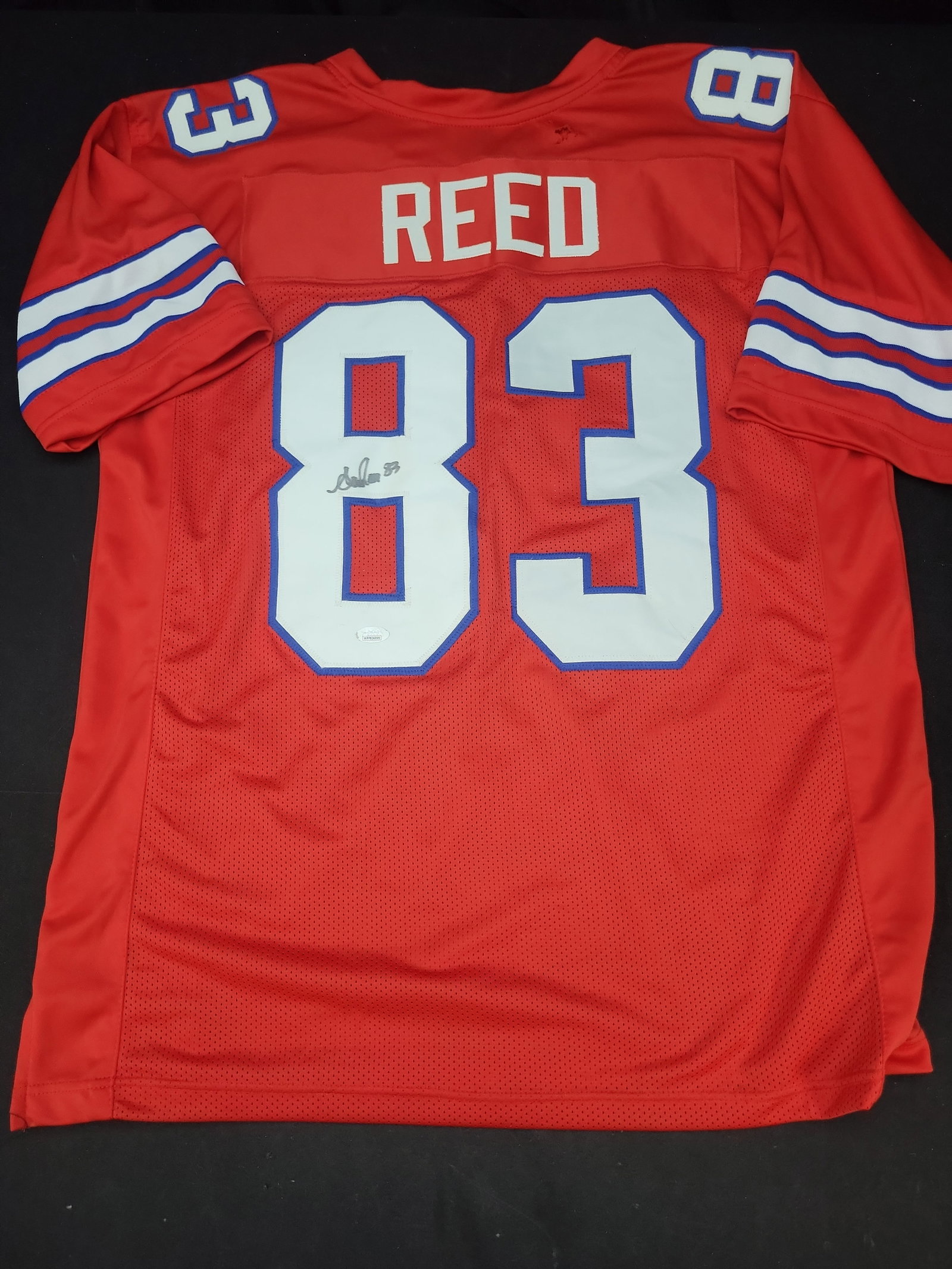 I03556 | Andre Reed Signed Buffalo Bills Custom Football Jersey with JSA Authentication: BID PER WHAT YOU SEE IN THE PHOTO, NOT THE AI GENERATED TITLES AND DESCRIPTIONS! Andre Reed Signed Buffalo Bills Custom Football Jersey with JSA Authentication This lot features an autographed custom 
