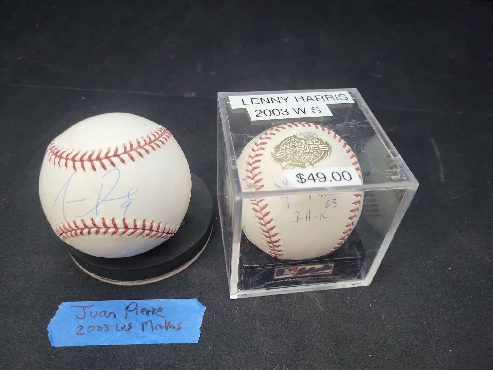 I03354 | Two Florida Marlins Autographed Baseballs Juan Pierre and Lenny Harris 2003 World Series (1 of 3)