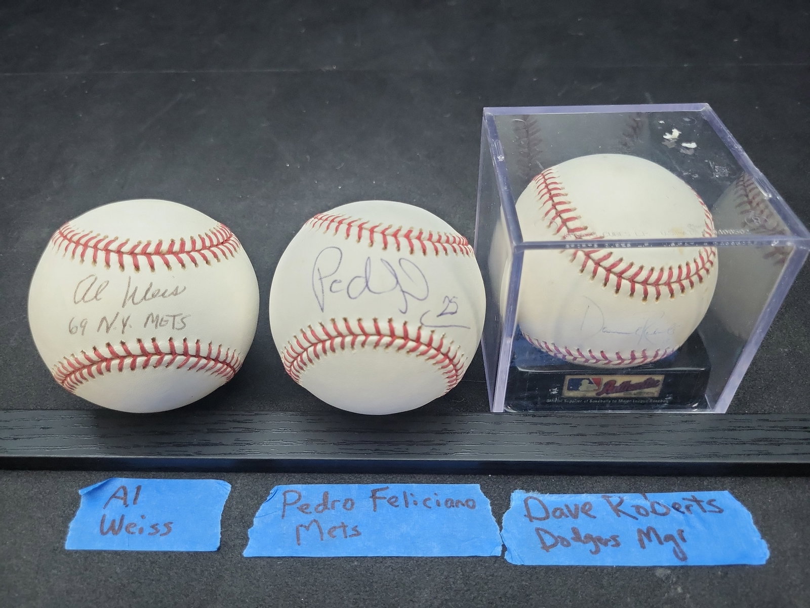 I03355 | Three Autographed Baseballs Featuring Al Weis, Pedro Feliciano, and Dave Roberts (1 of 4)