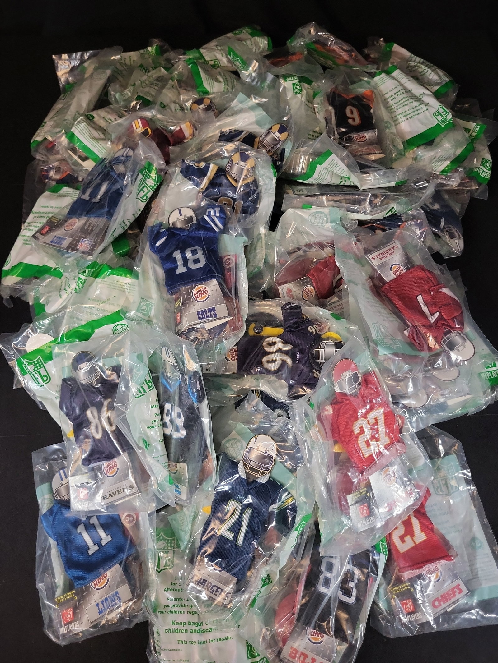 I03237 | A Collection of 2007 Burger King NFL Mini Jerseys in Original Packaging (1 of 6)