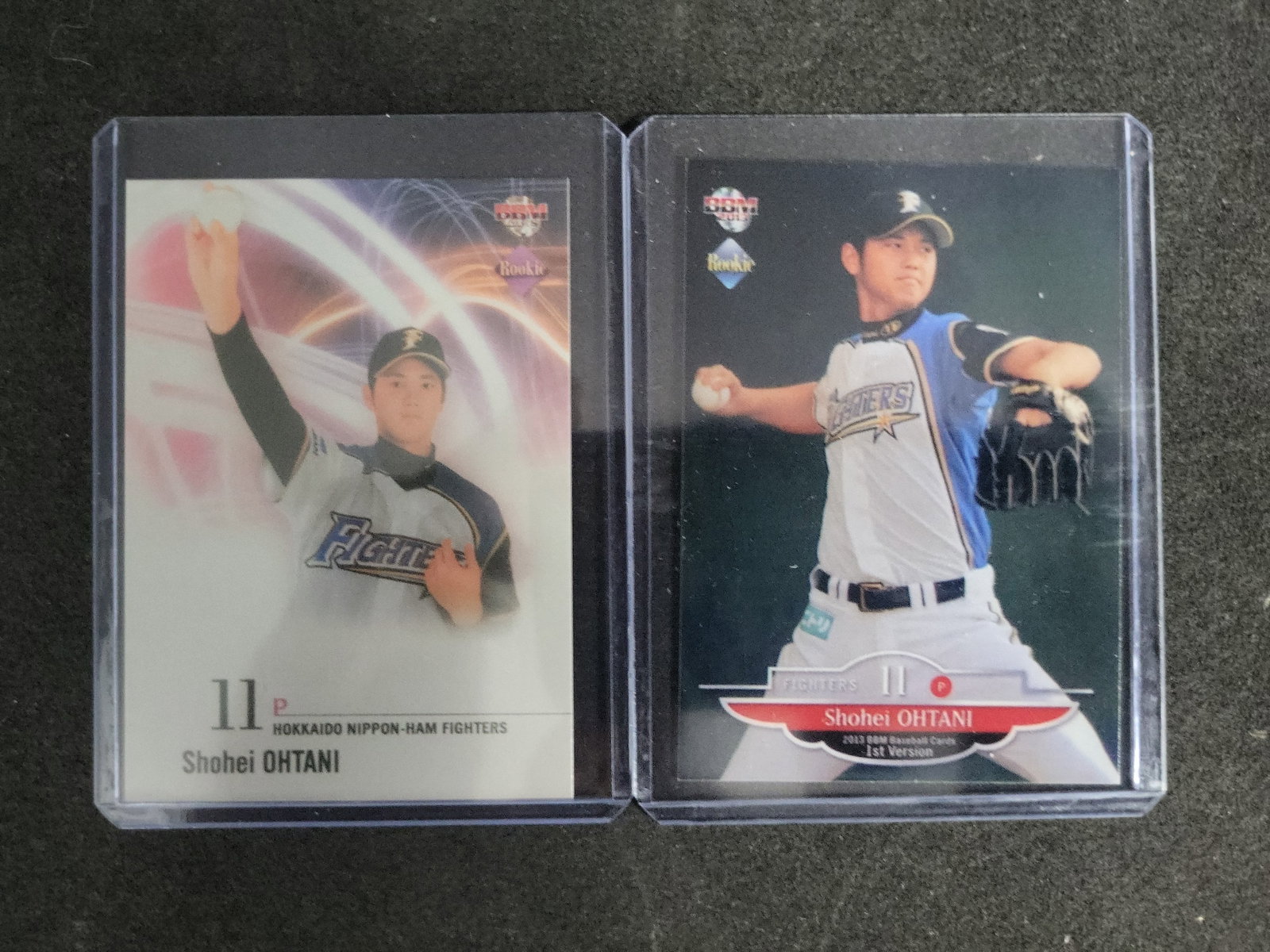 I03279 | A Collection of Shohei Ohtani BBM Japanese Baseball Trading Cards Including 2013 Rookie: BID PER WHAT YOU SEE IN THE PHOTO, NOT THE AI GENERATED TITLES AND DESCRIPTIONS! A collection of four Japanese baseball trading cards produced by BBM (Baseball Magazine Sha) featuring Shohei Ohtani du