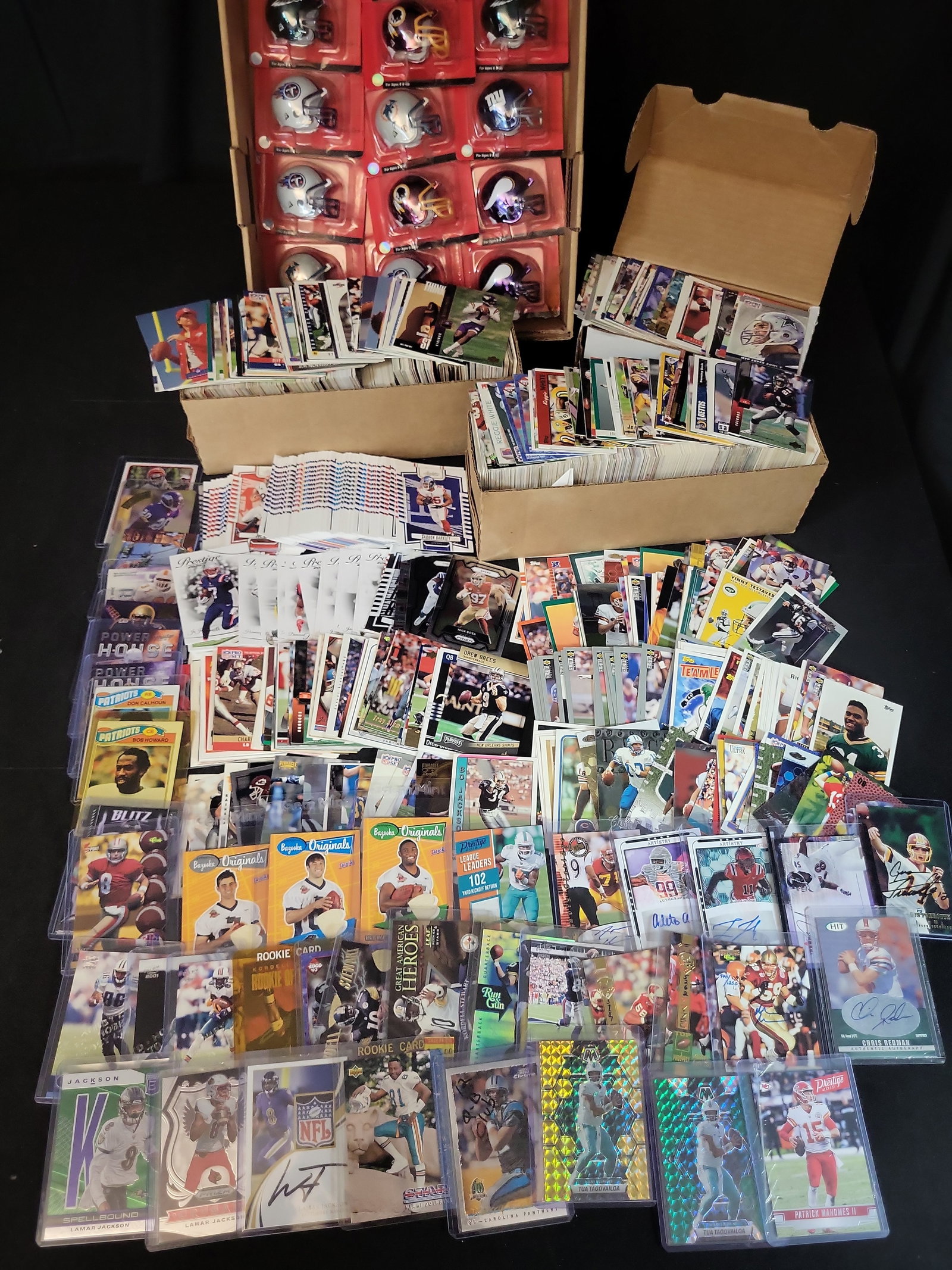 I03650 | An Assortment of Professional Football Trading Cards and Riddell Pocket Pro Helmets Late (1 of 13)