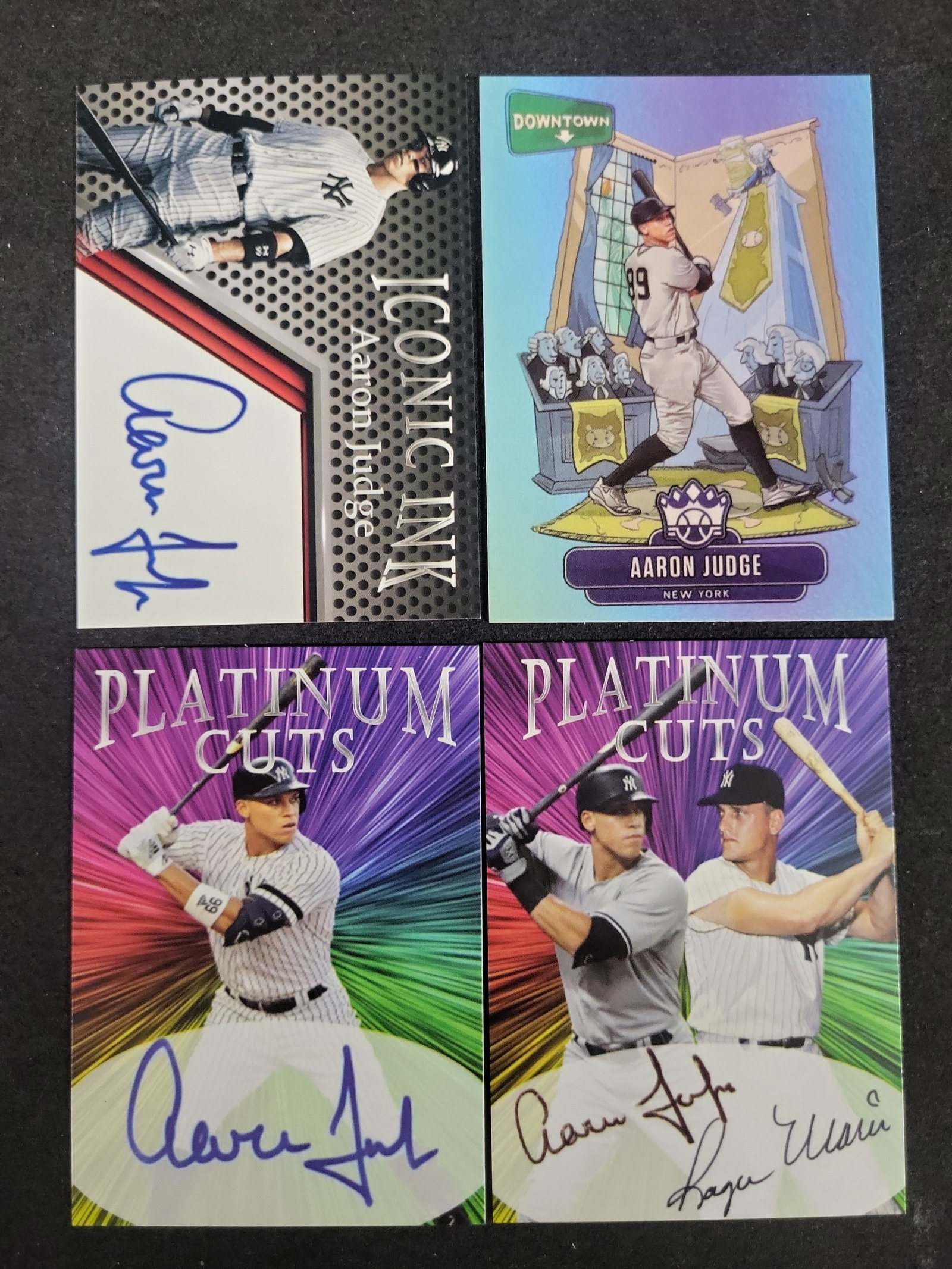 I03594 | A Lot of Four Aaron Judge Baseball Cards Including 2020 Panini Diamond Kings Downtown: BID PER WHAT YOU SEE IN THE PHOTO, NOT THE AI GENERATED TITLES AND DESCRIPTIONS! A Lot of Four Aaron Judge Baseball Cards Including 2020 Panini Diamond Kings Downtown Insert This lot consists of four 