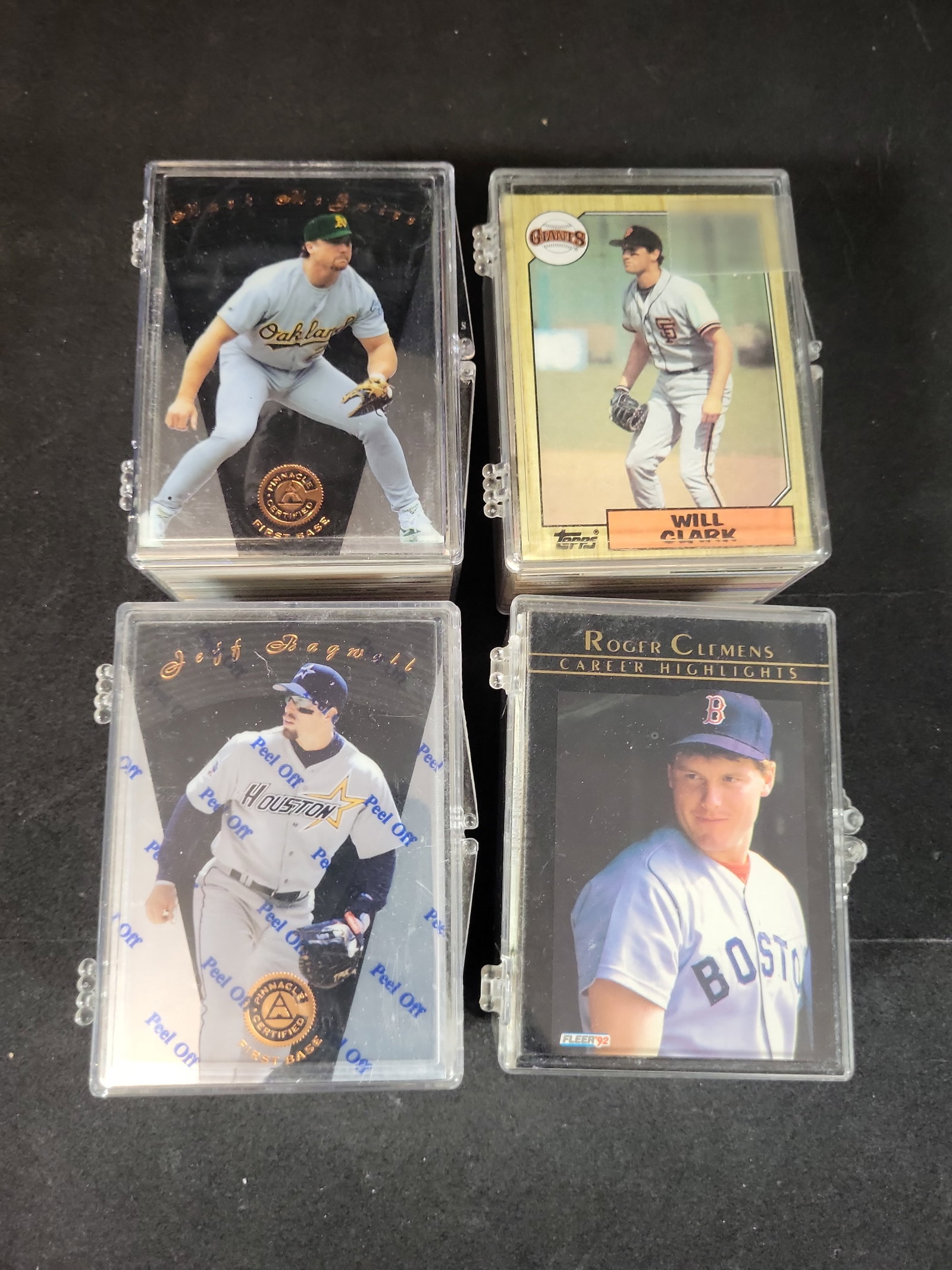 I03224 | A Collection of Baseball Trading Card Player Lots Including Jeff Bagwell Roger Clemens Mark: BID PER WHAT YOU SEE IN THE PHOTO, NOT THE AI GENERATED TITLES AND DESCRIPTIONS! This collection consists of four player-specific lots of baseball trading cards dating from the late 1980s through the 