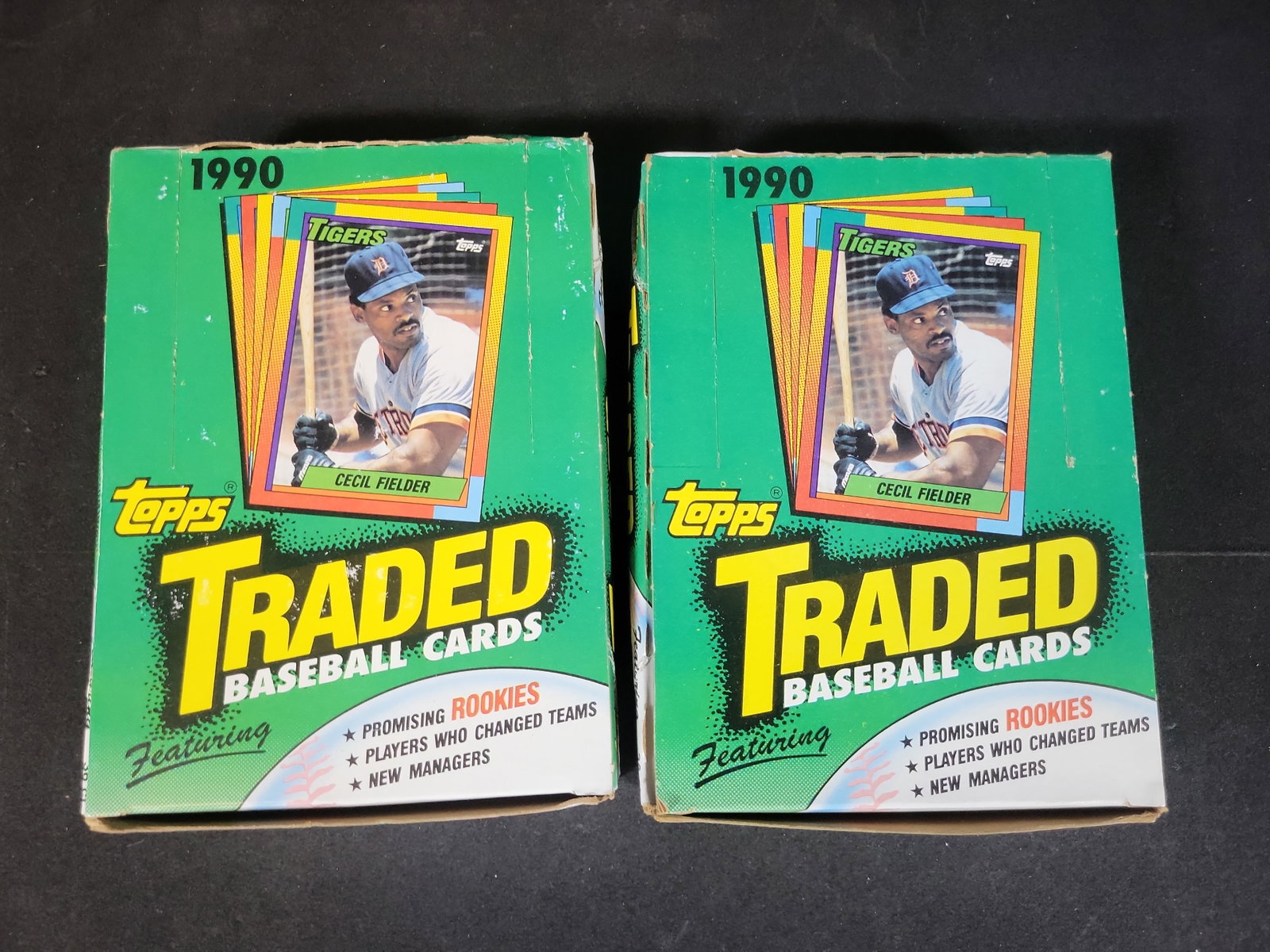 I03231 | A Pair of 1990 Topps Traded Baseball Card Display Boxes with 36 Unopened Packs Each: BID PER WHAT YOU SEE IN THE PHOTO, NOT THE AI GENERATED TITLES AND DESCRIPTIONS! Topps 1990 Traded Baseball Cards series. This lot includes two open retail display boxes, each containing thirty-six un