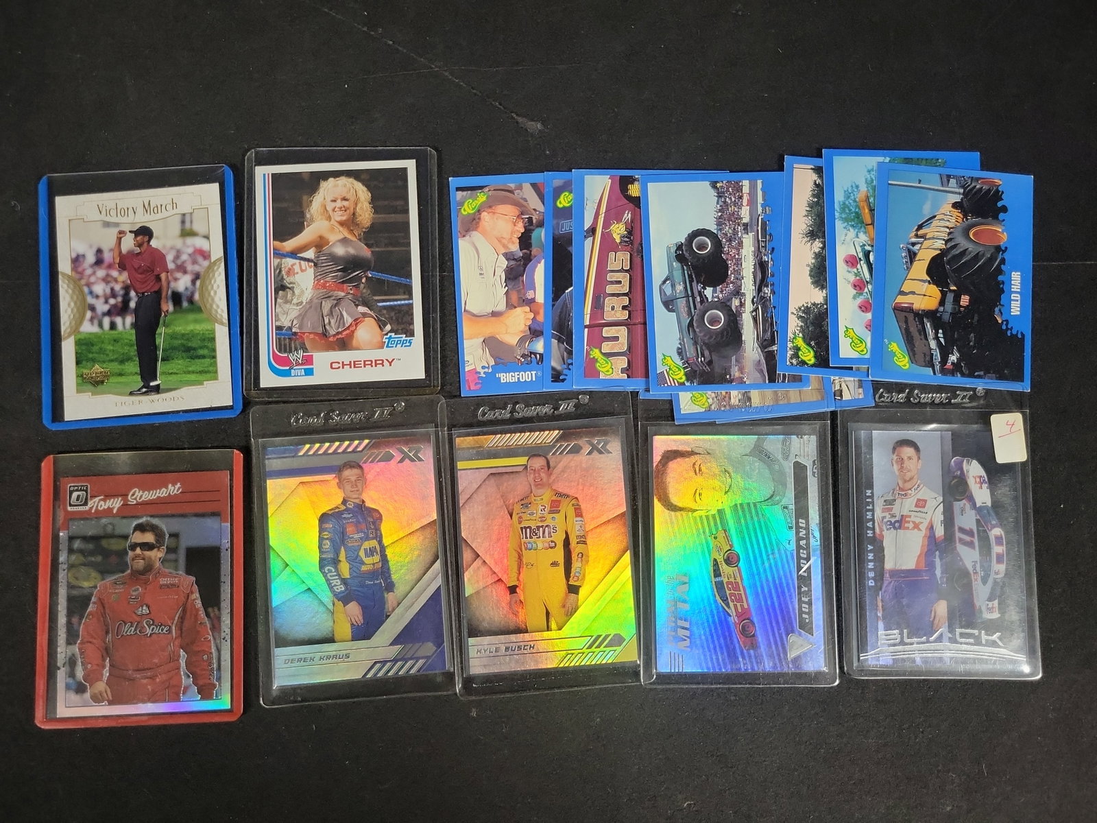 I03841 | An Assortment of NASCAR Tiger Woods Golf WWE and Monster Truck Trading Cards (1 of 7)