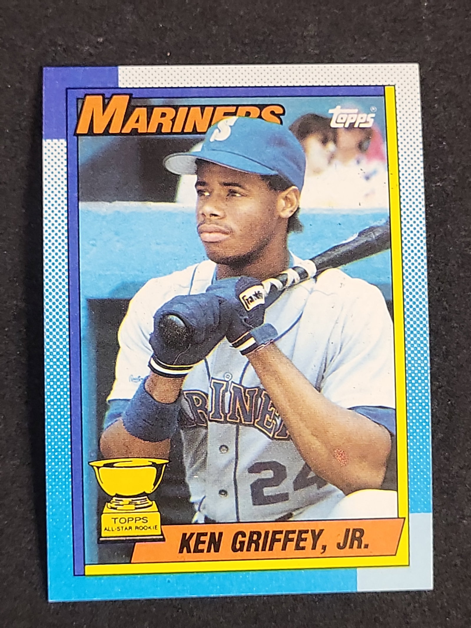 I03883 | 1990 Topps Ken Griffey Jr. All-Star Rookie Card Number 336 Bloody Arm Error: BID PER WHAT YOU SEE IN THE PHOTO, NOT THE AI GENERATED TITLES AND DESCRIPTIONS! This 1990 Topps baseball trading card features Seattle Mariners outfielder Ken Griffey Jr. and is designated as card nu
