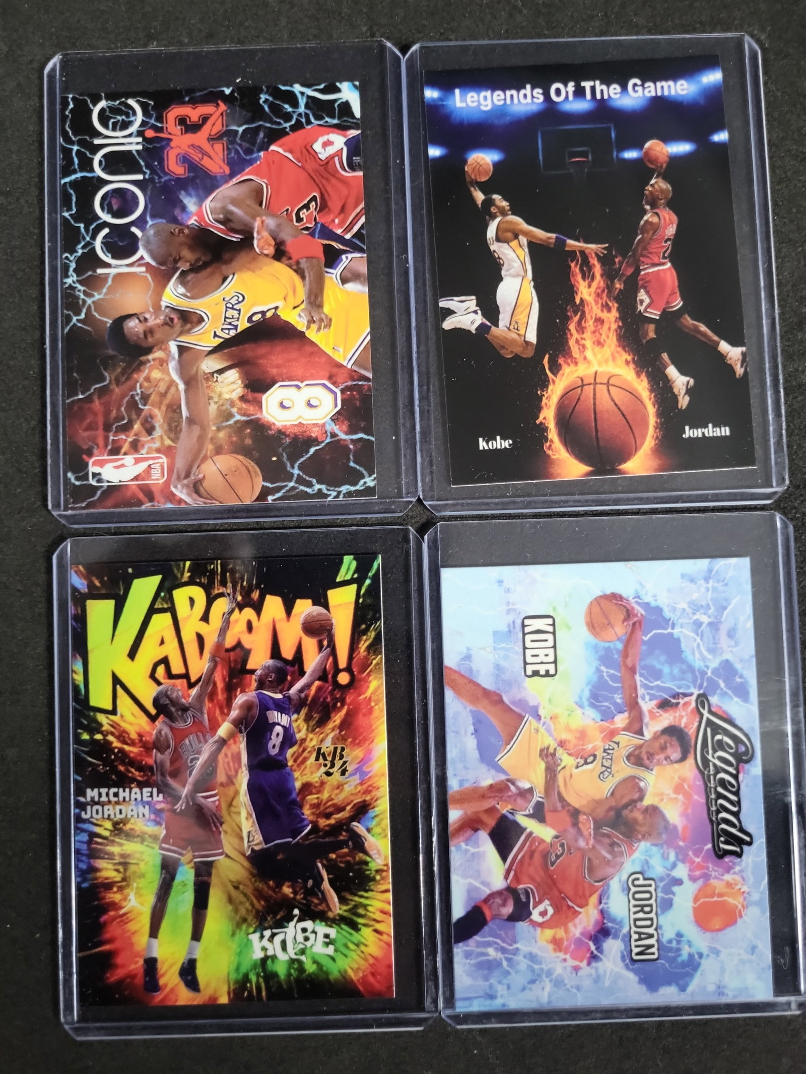 I03283 | Lot of Four Michael Jordan and Kobe Bryant Unlicensed Custom Art Trading Cards: BID PER WHAT YOU SEE IN THE PHOTO, NOT THE AI GENERATED TITLES AND DESCRIPTIONS! A collection of four modern unlicensed custom art trading cards featuring NBA legends Michael Jordan and Kobe Bryant. T