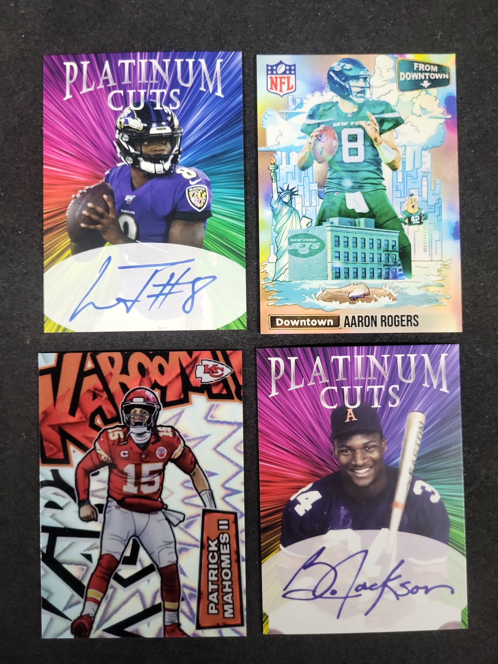 I03602 | A Collection of Four Modern Football Trading Cards Featuring Aaron Rodgers, Patrick Mahomes (1 of 2)