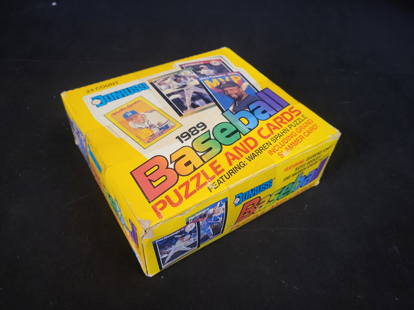 I01031 | 1989 Donruss Baseball Grand Slammer 24-Count Retail Box: BID PER WHAT YOU SEE IN THE PHOTO, NOT THE AI GENERATED TITLES AND DESCRIPTIONS! 1989 Donruss Baseball Grand Slammer 24-Count Retail Box This is a 1989 Donruss Baseball Grand Slammer retail box contai