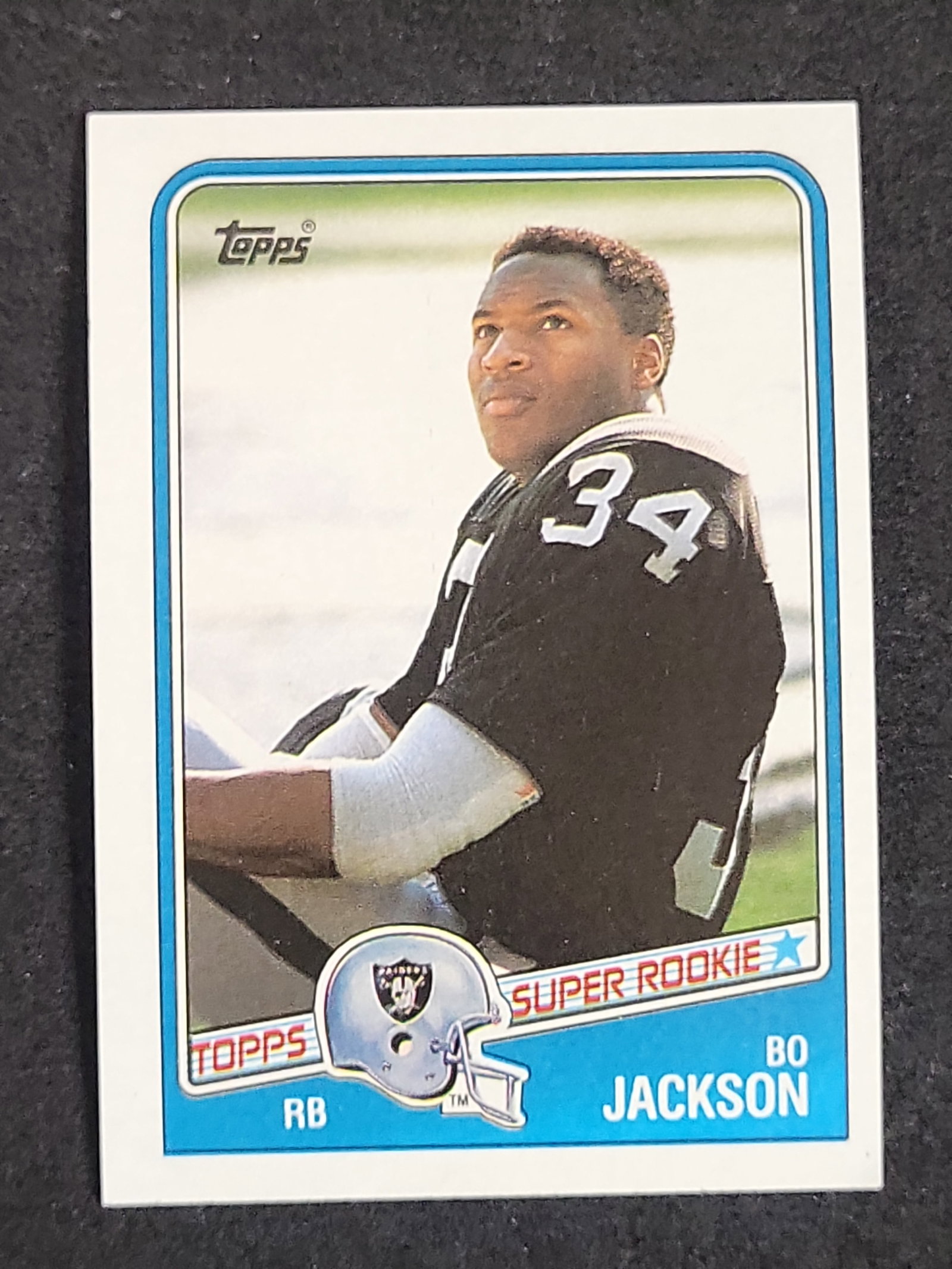 I03881 | 1988 Topps Football Bo Jackson Rookie Card #327 Los Angeles Raiders: BID PER WHAT YOU SEE IN THE PHOTO, NOT THE AI GENERATED TITLES AND DESCRIPTIONS! This is a 1988 Topps football trading card featuring Bo Jackson of the Los Angeles Raiders. The card is identified as n