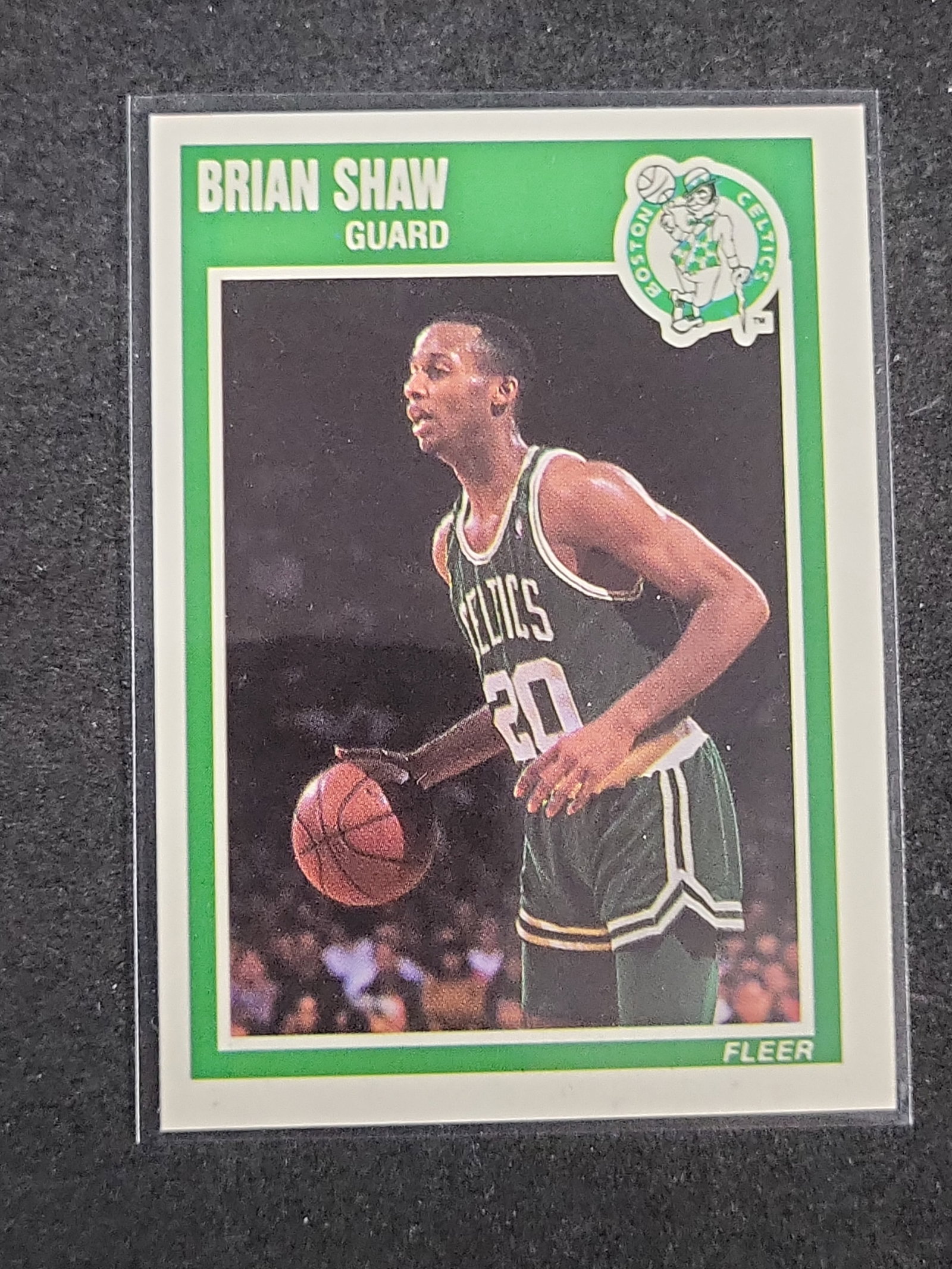 I03160 | 1989-90 Fleer Brian Shaw Rookie Card #14 Boston Celtics: BID PER WHAT YOU SEE IN THE PHOTO, NOT THE AI GENERATED TITLES AND DESCRIPTIONS! 1989-90 Fleer Brian Shaw Rookie Card #14 Boston Celtics This is a 1989-90 Fleer basketball trading card featuring Brian