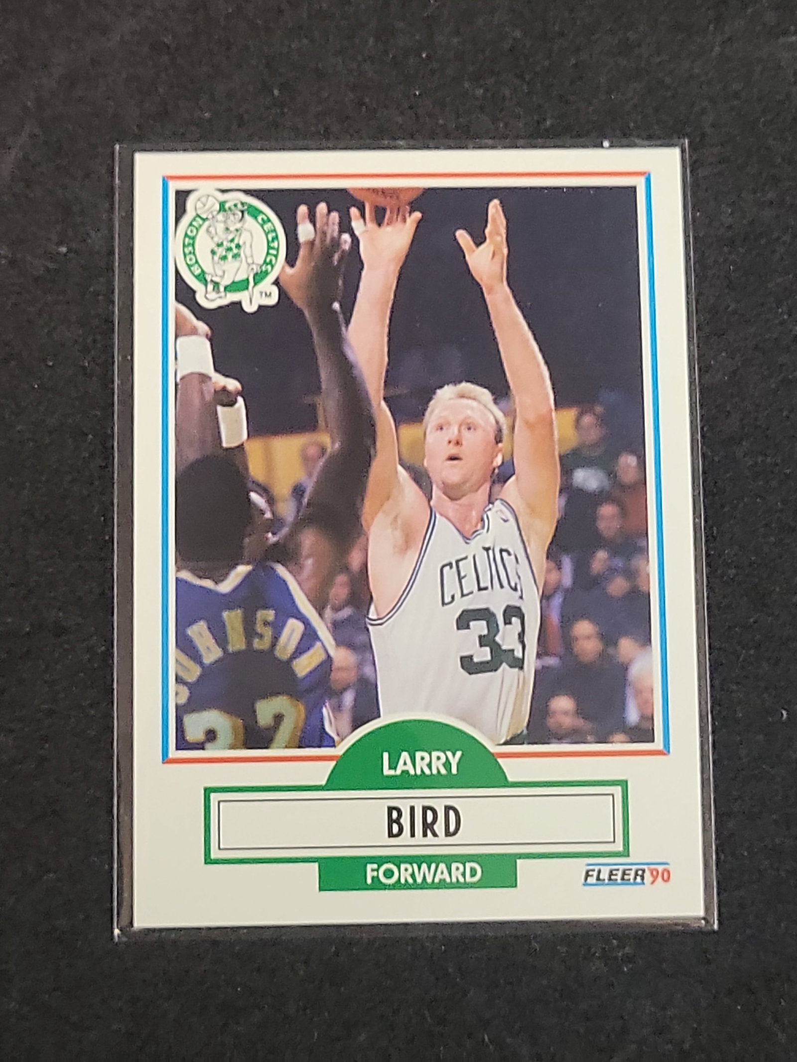 I03158 | 1990-91 Fleer Larry Bird Basketball Card No. 8: BID PER WHAT YOU SEE IN THE PHOTO, NOT THE AI GENERATED TITLES AND DESCRIPTIONS! 1990-91 Fleer Larry Bird Basketball Card No. 8 This is a standard 1990-91 Fleer basketball card featuring Hall of Famer