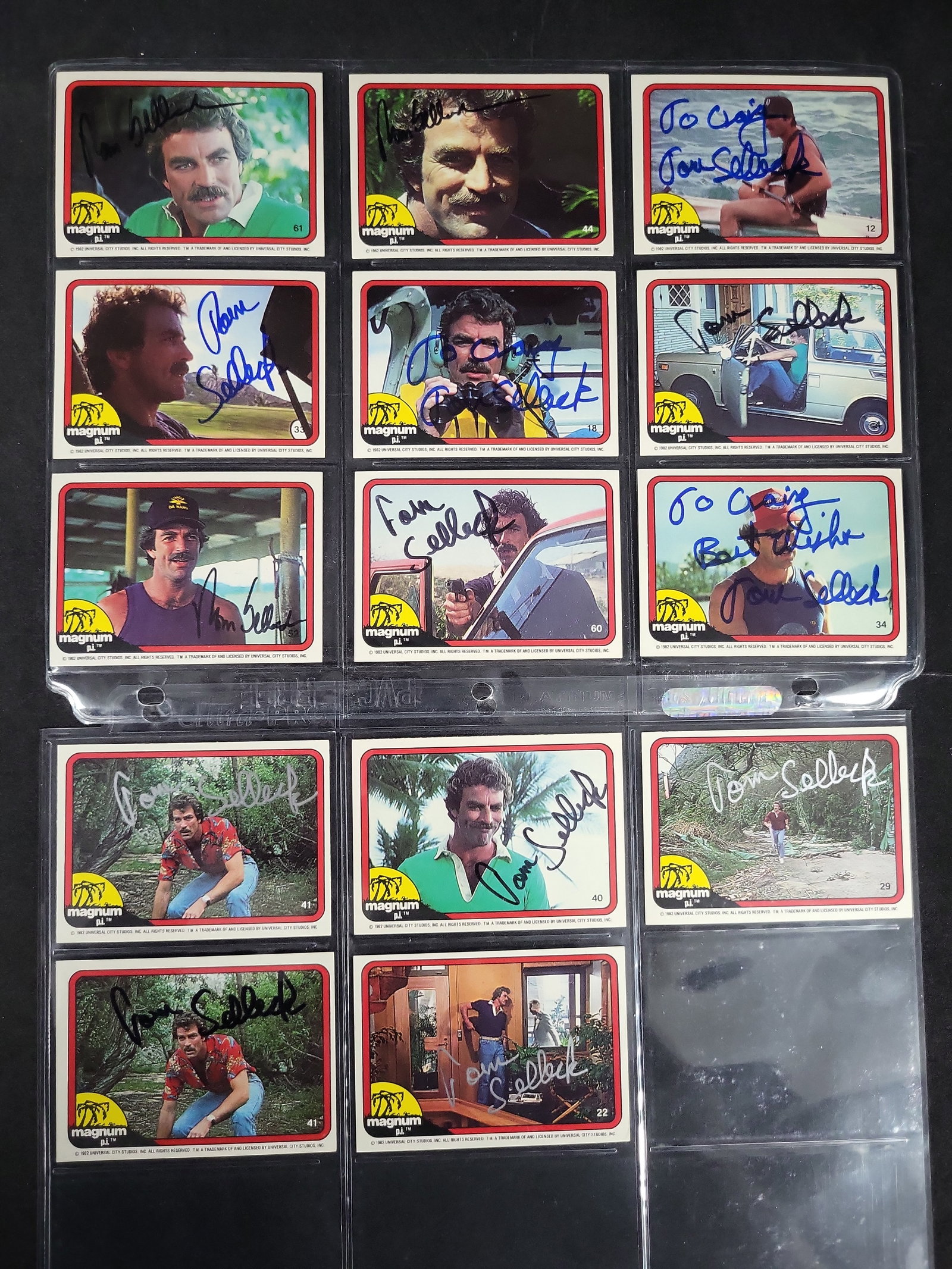 I03443 | Fourteen 1982 Donruss Magnum, P.I. Trading Cards Autographed by Tom Selleck: BID PER WHAT YOU SEE IN THE PHOTO, NOT THE AI GENERATED TITLES AND DESCRIPTIONS! A collection of fourteen vintage base trading cards from the 1982 Donruss Magnum, P.I. television series set, each hand