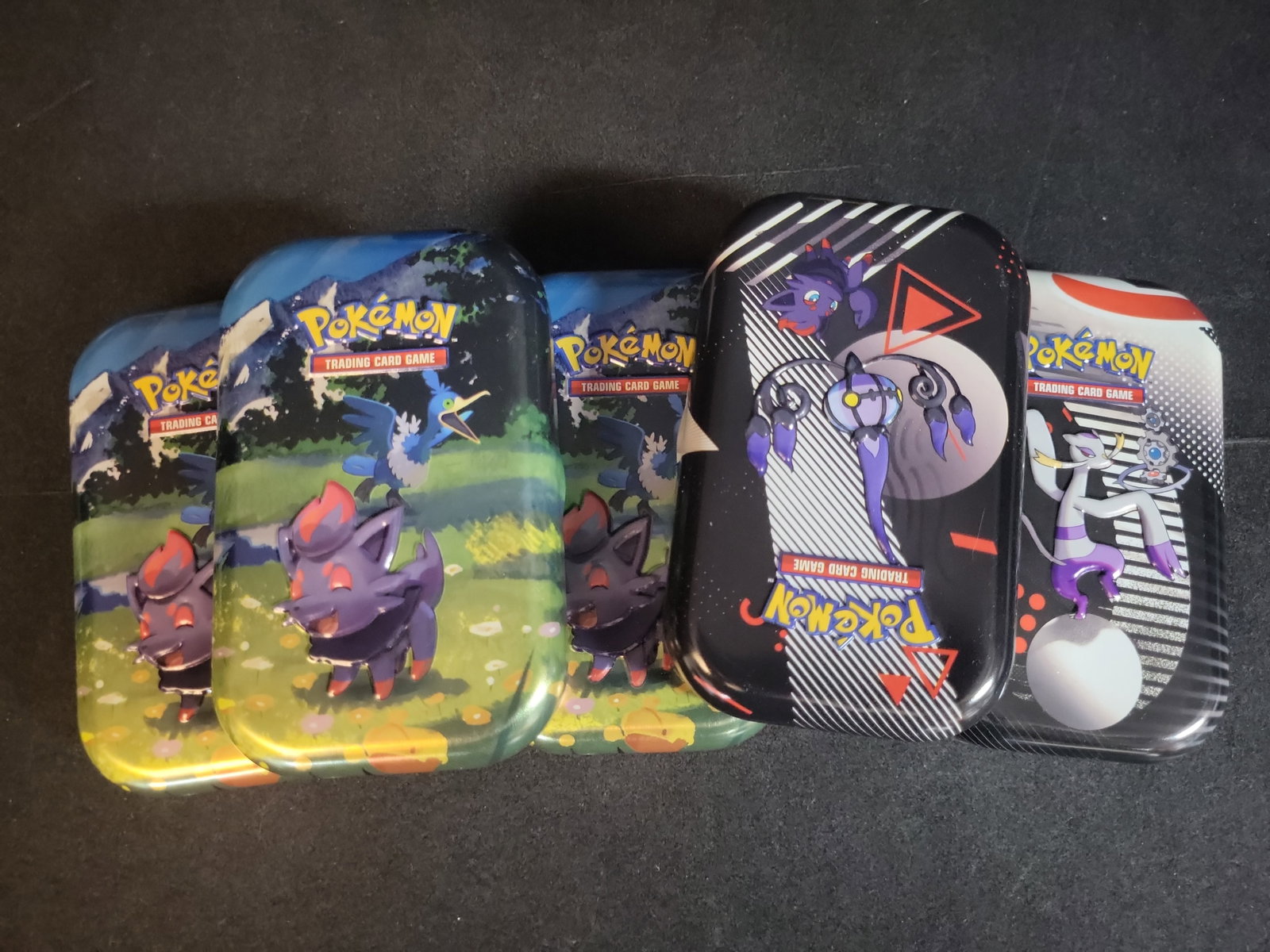 I02746 | A Collection of Pokemon TCG Cards and Unova Series Mini Tins (1 of 10)