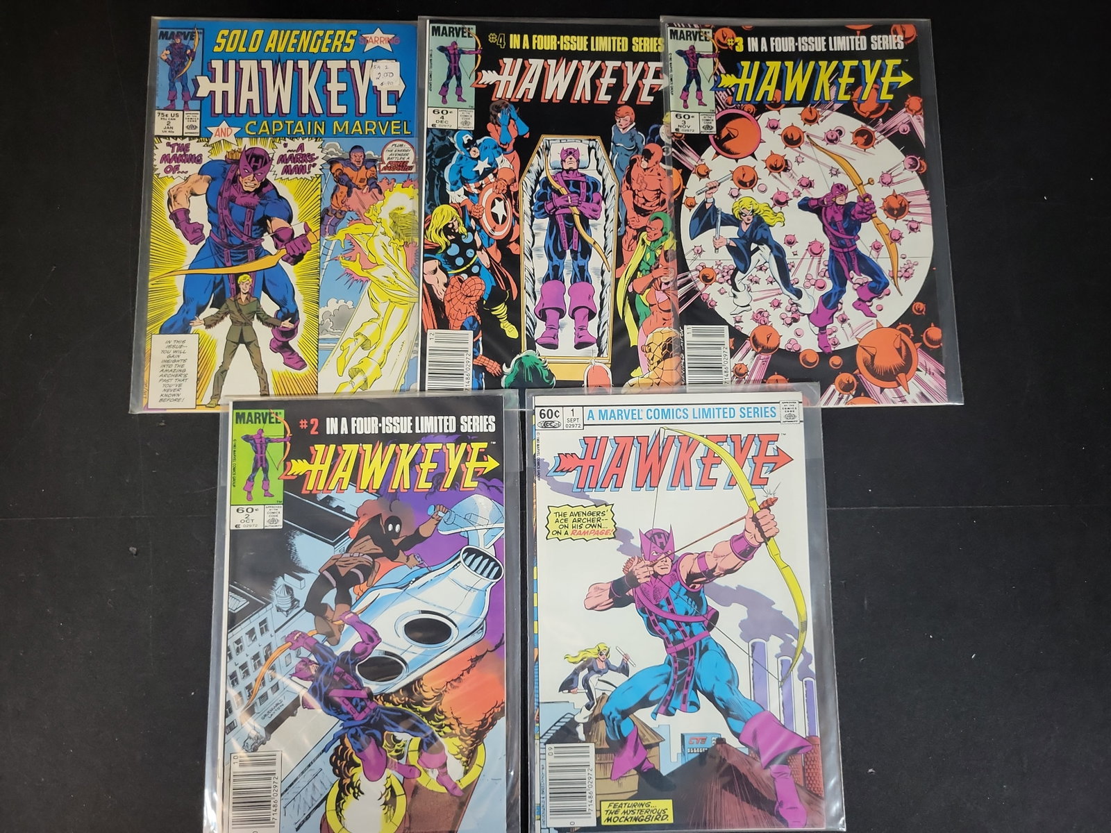 I03707 | A Collection of Five Vintage Marvel Hawkeye Comic Books Including 1983 Limited Series Set (1 of 7)