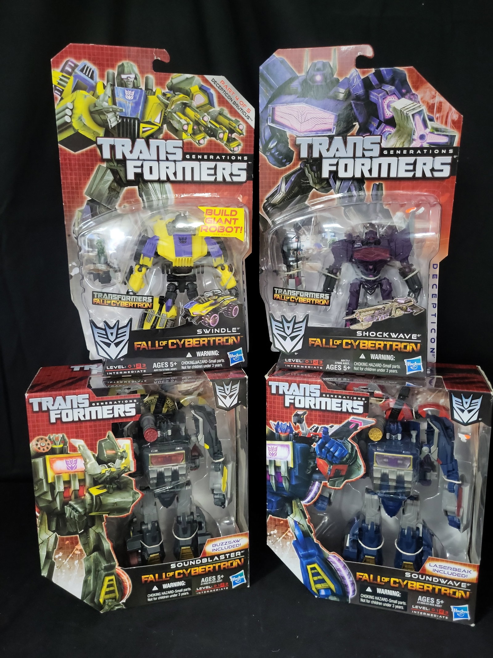 I03524 | A Set of Four Hasbro Transformers Generations Fall of Cybertron Action Figures (1 of 7)